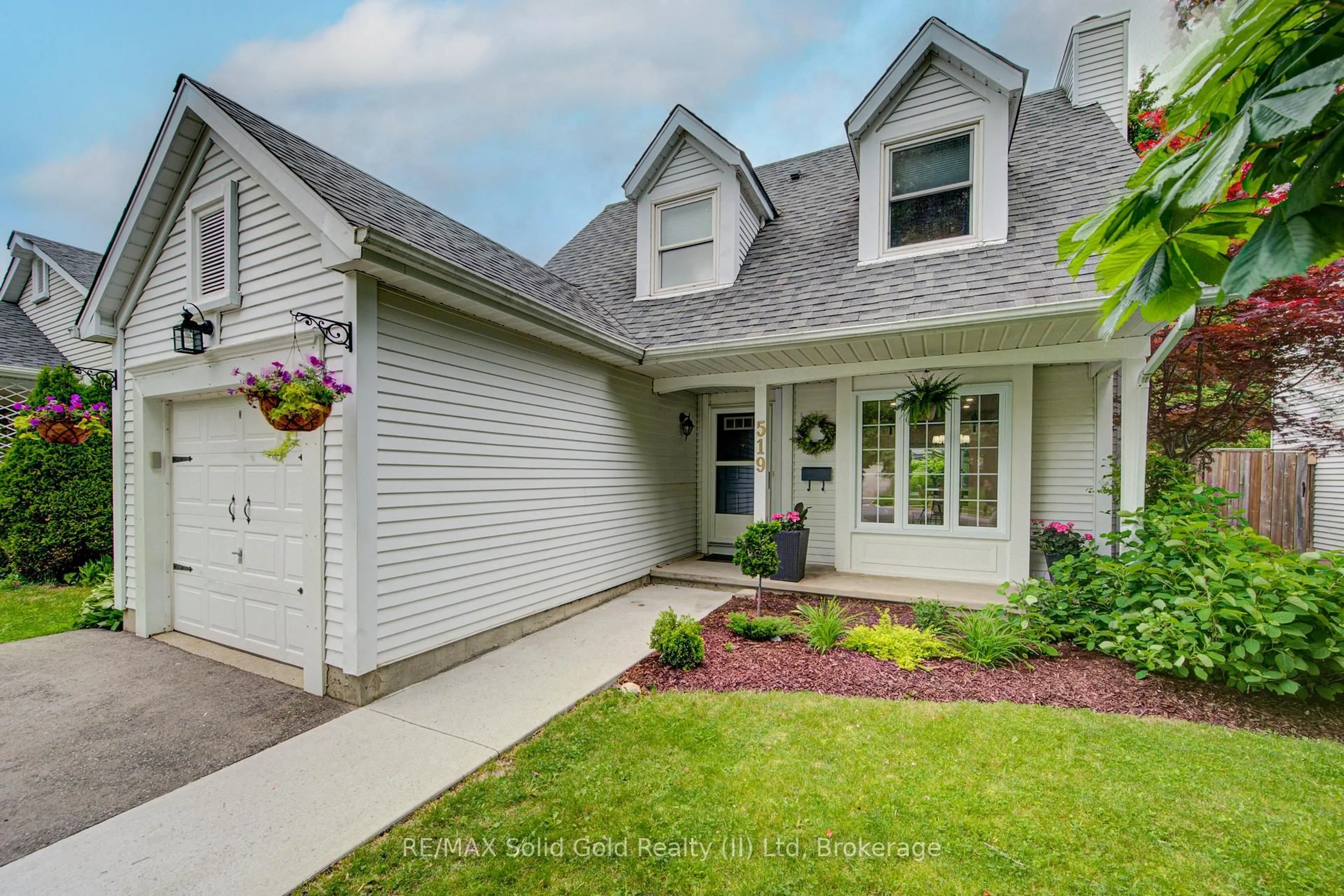 Home with vinyl exterior material, street for 519 Westvale Dr, Waterloo Ontario N2T 2B6