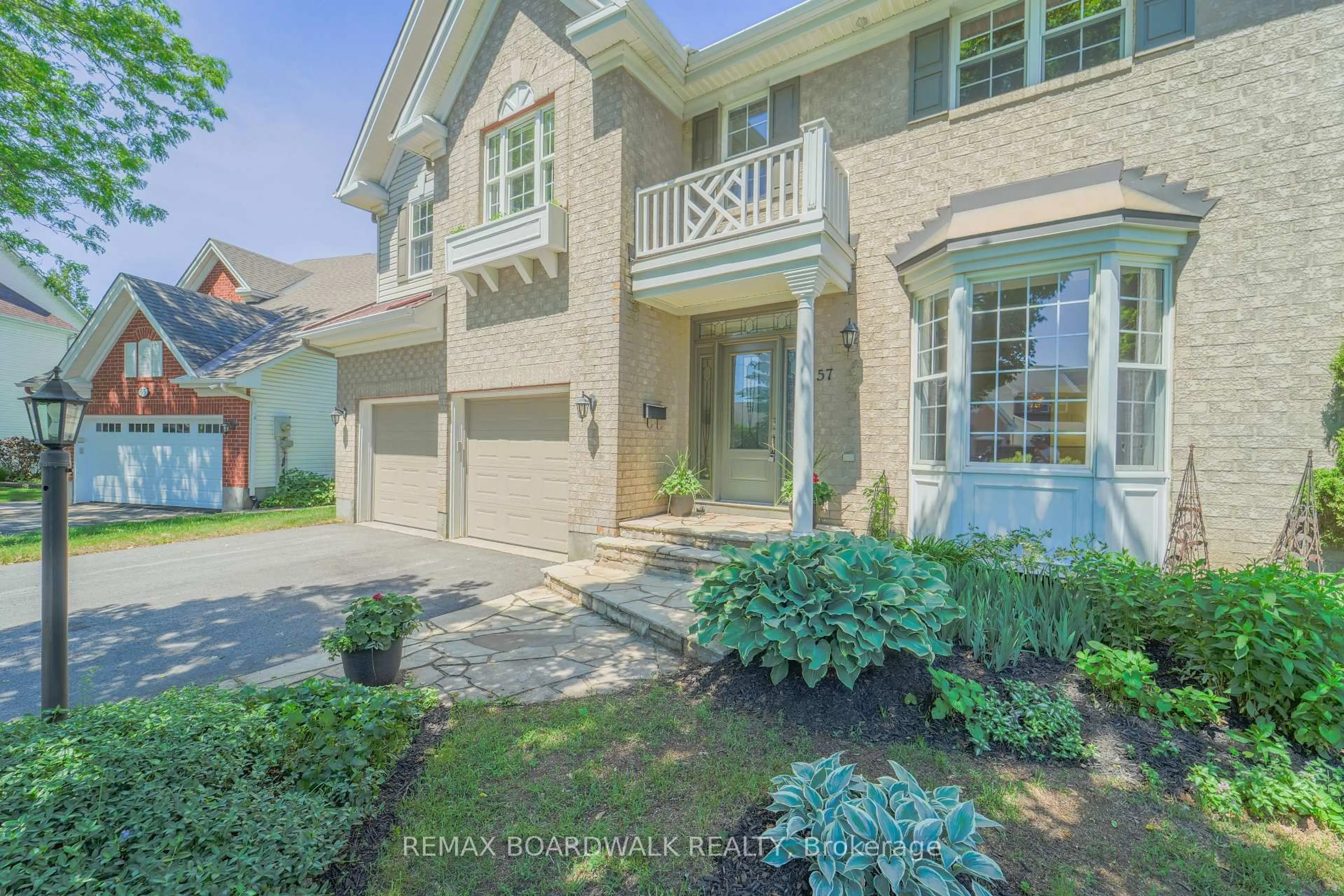 Home with brick exterior material, street for 57 Mattawa Cres, Ottawa Ontario K2M 2E8