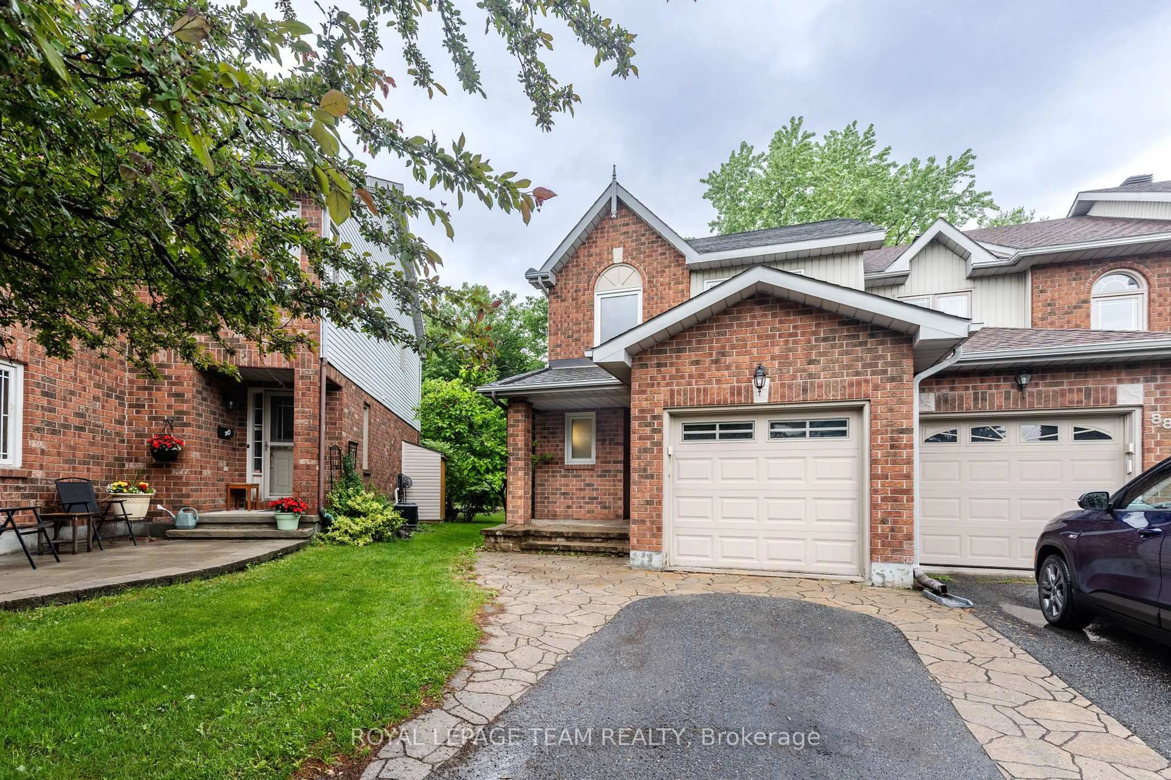 Home with brick exterior material, street for 90 Blackdome Cres, Ottawa Ontario K2T 1B1
