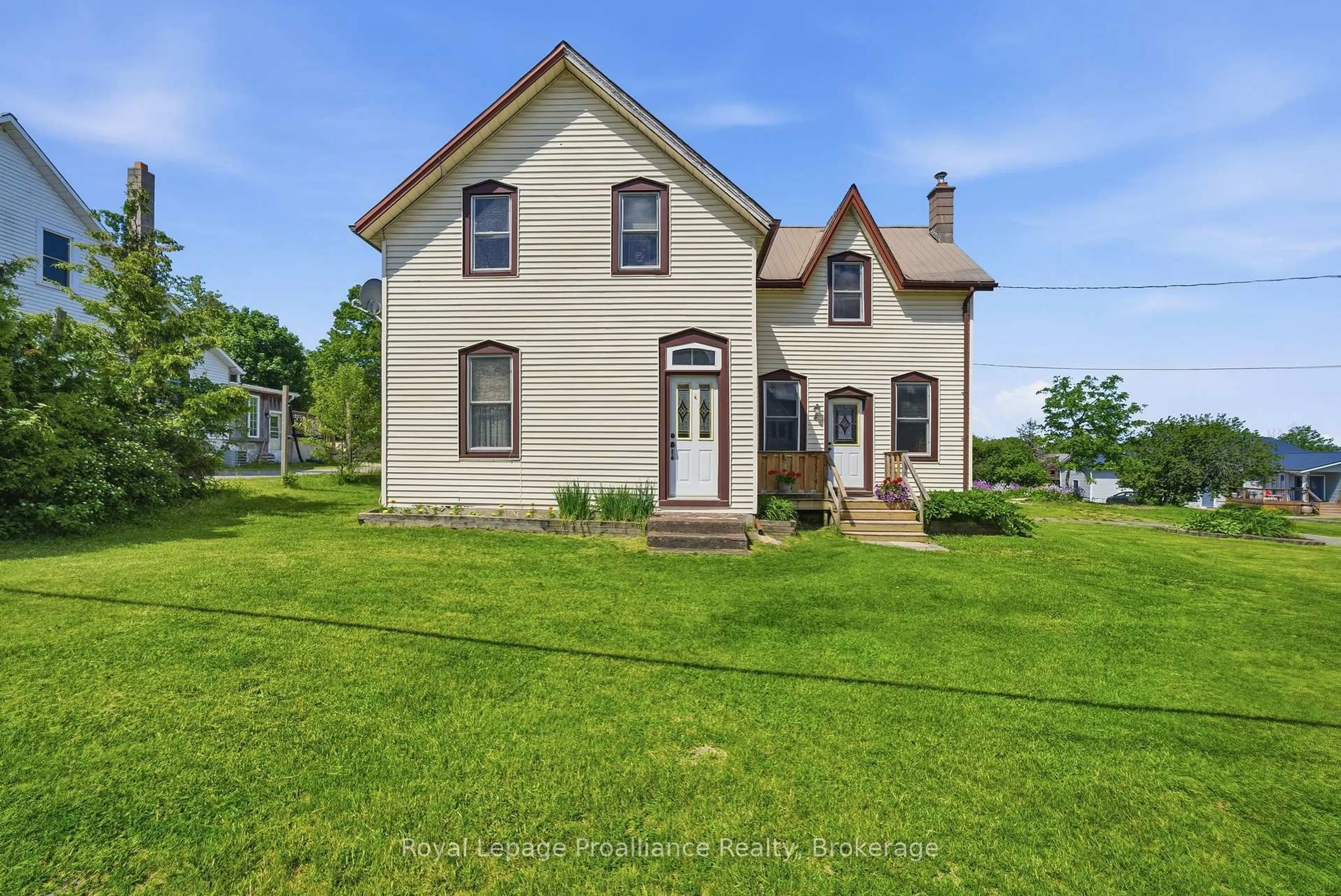 A pic from outside/outdoor area/front of a property/back of a property/a pic from drone, street for 89 County Rd 29 Rd, Prince Edward County Ontario K0K 1T0
