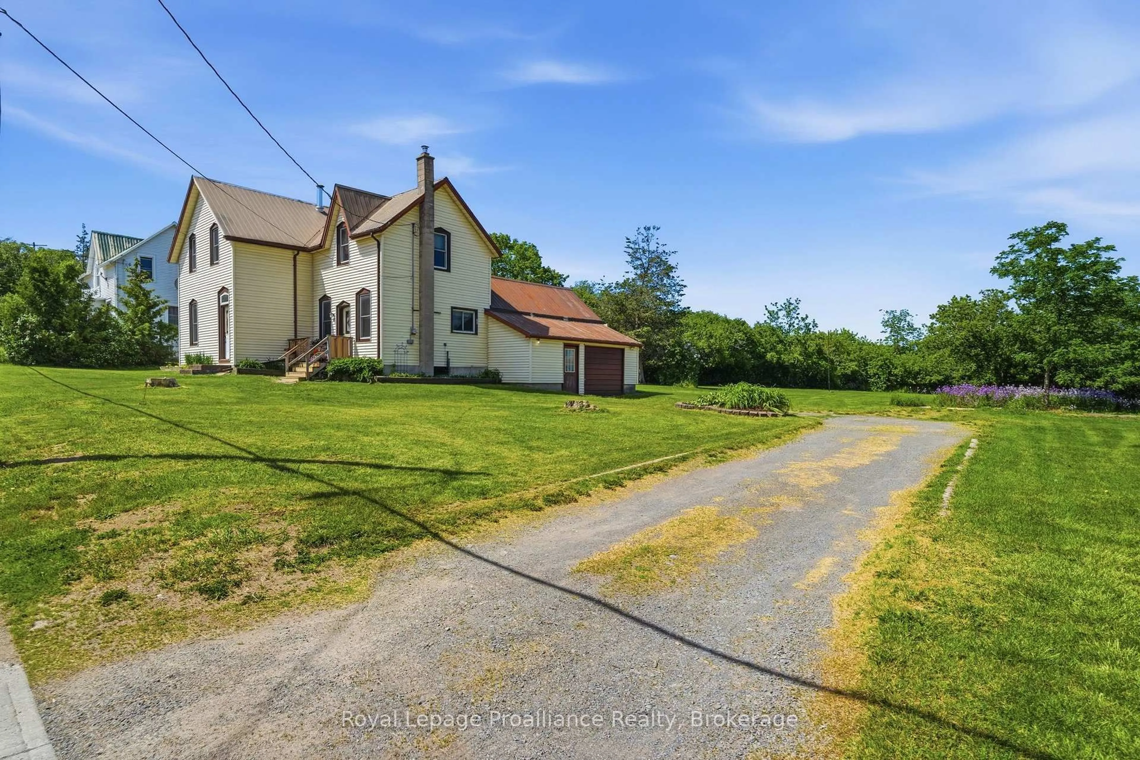 A pic from outside/outdoor area/front of a property/back of a property/a pic from drone, street for 89 County Rd 29 Rd, Prince Edward County Ontario K0K 1T0