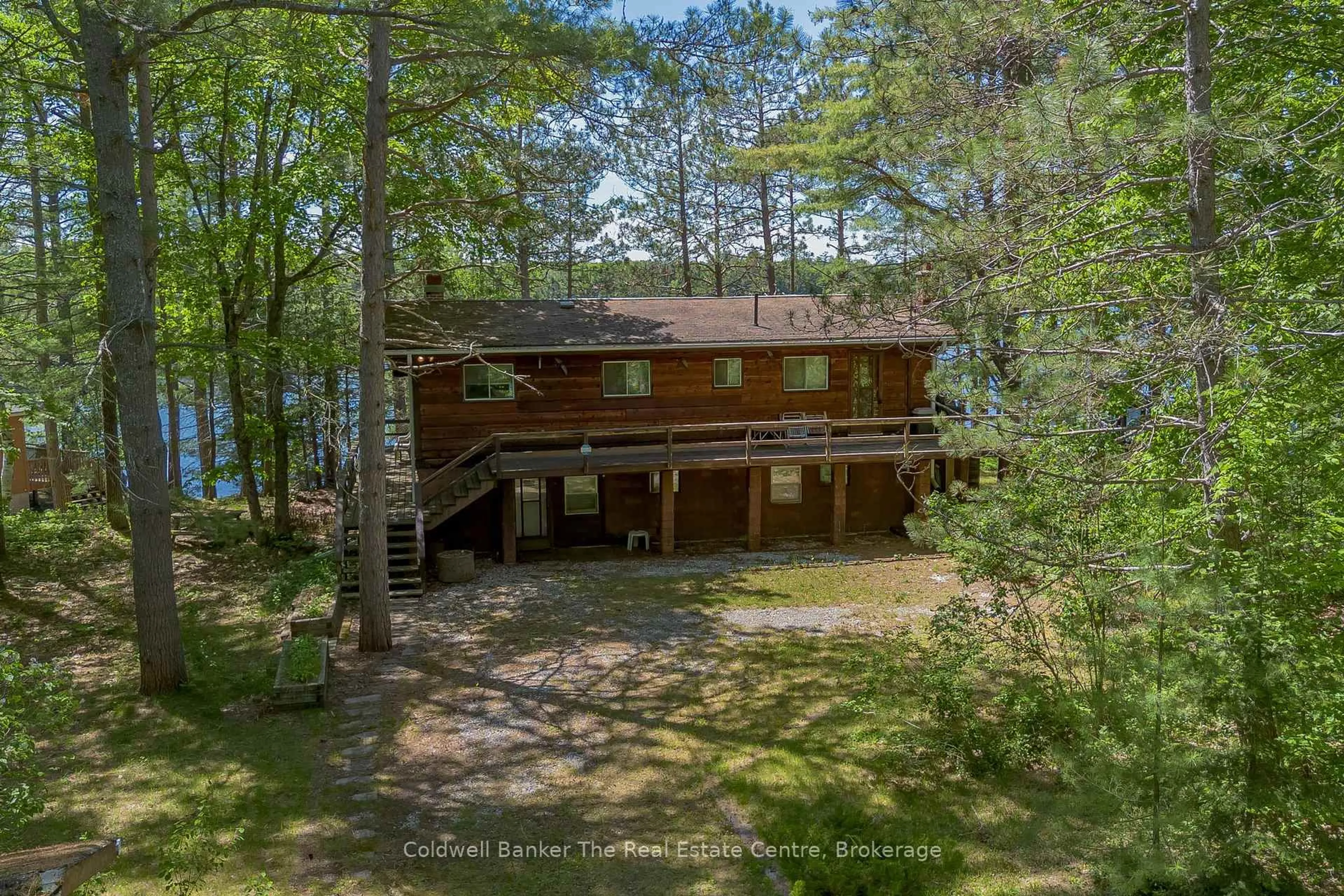 A pic from outside/outdoor area/front of a property/back of a property/a pic from drone, water/lake/river/ocean view for 1077 Misty Lane, Gravenhurst Ontario P0E 1G0