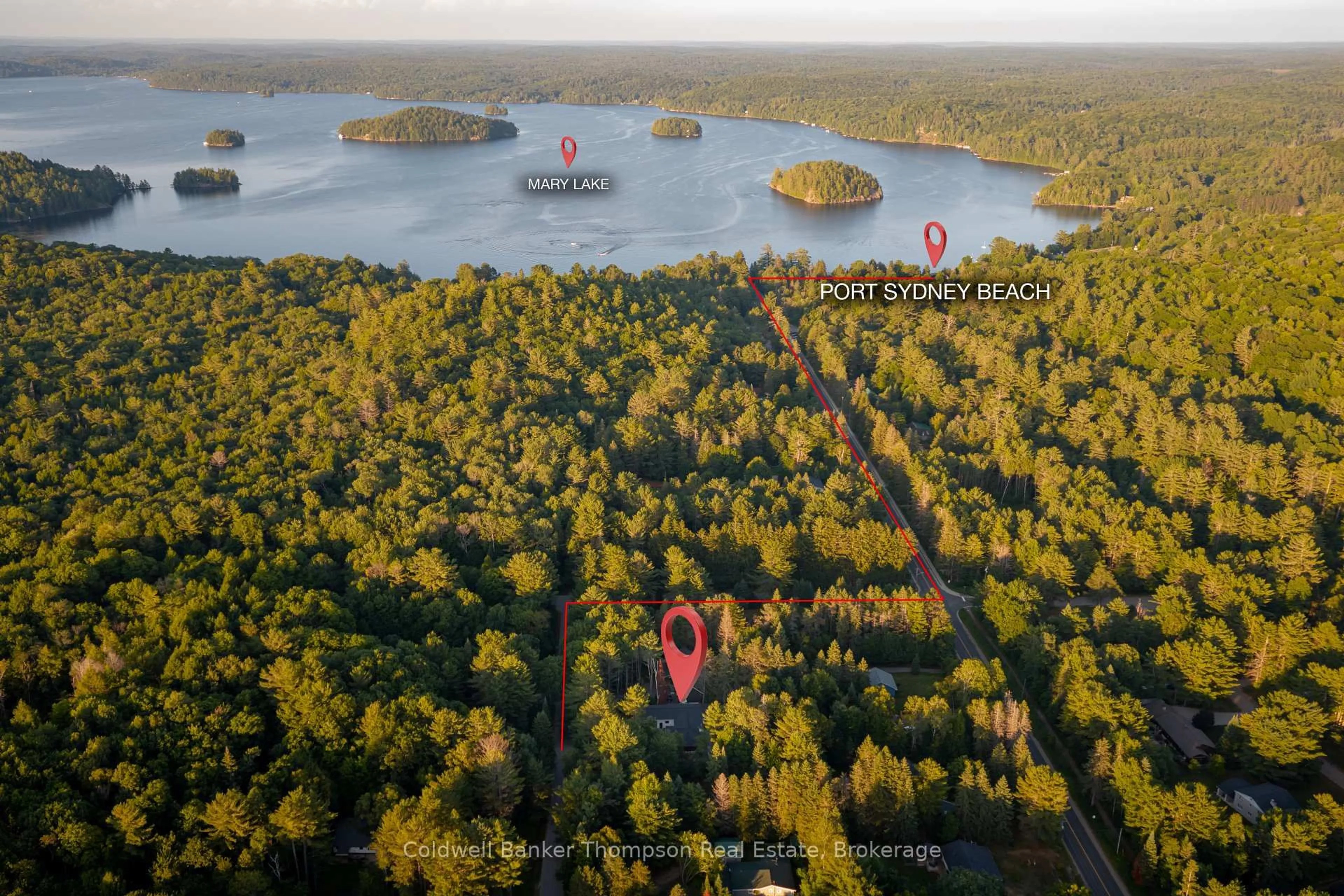 A pic from outside/outdoor area/front of a property/back of a property/a pic from drone, water/lake/river/ocean view for 105 Spruce Dr, Huntsville Ontario P0B 1L0