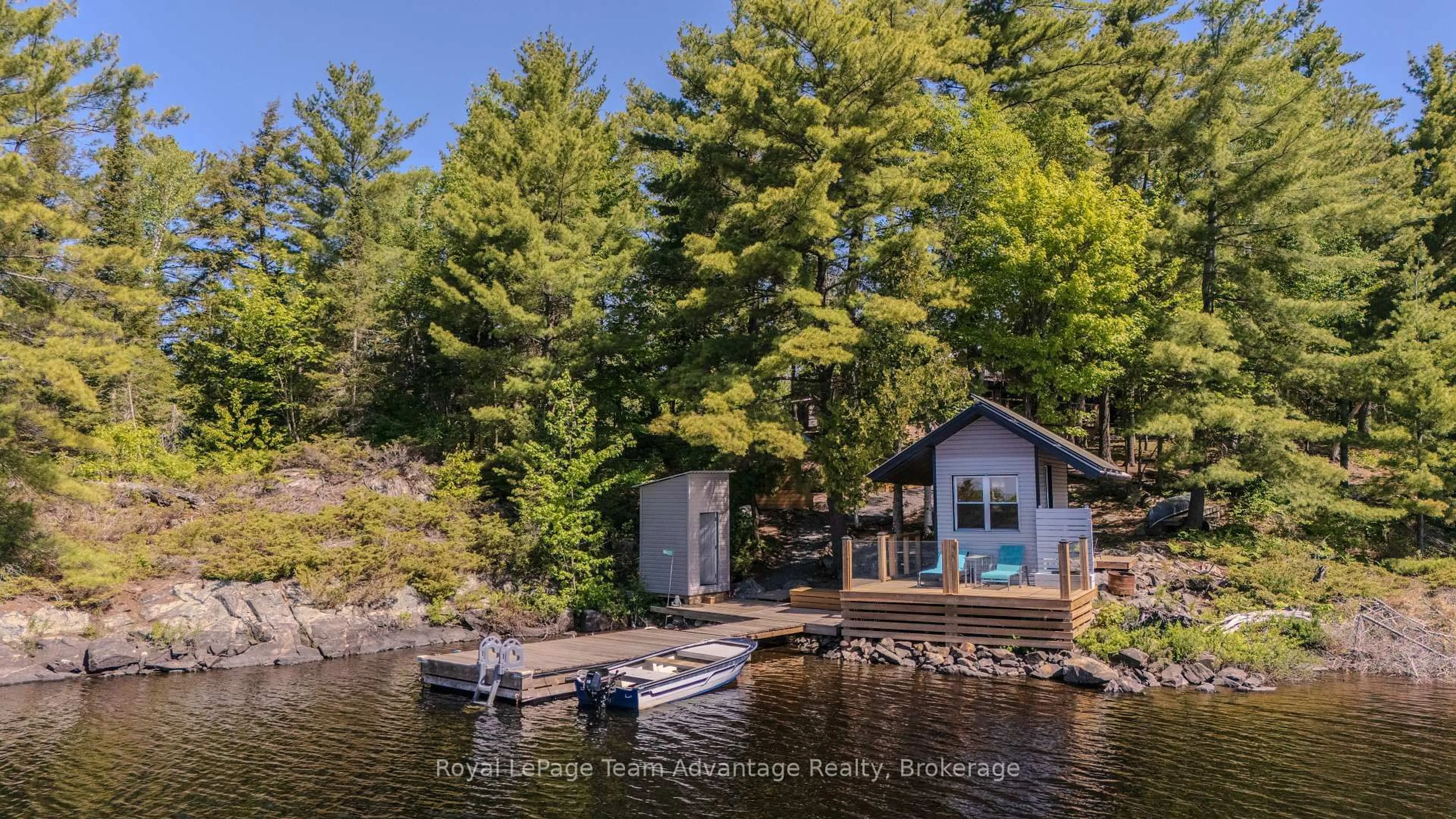 A pic from outside/outdoor area/front of a property/back of a property/a pic from drone, water/lake/river/ocean view for 420 Shawanaga Lake, Whitestone Ontario P0A 1G0