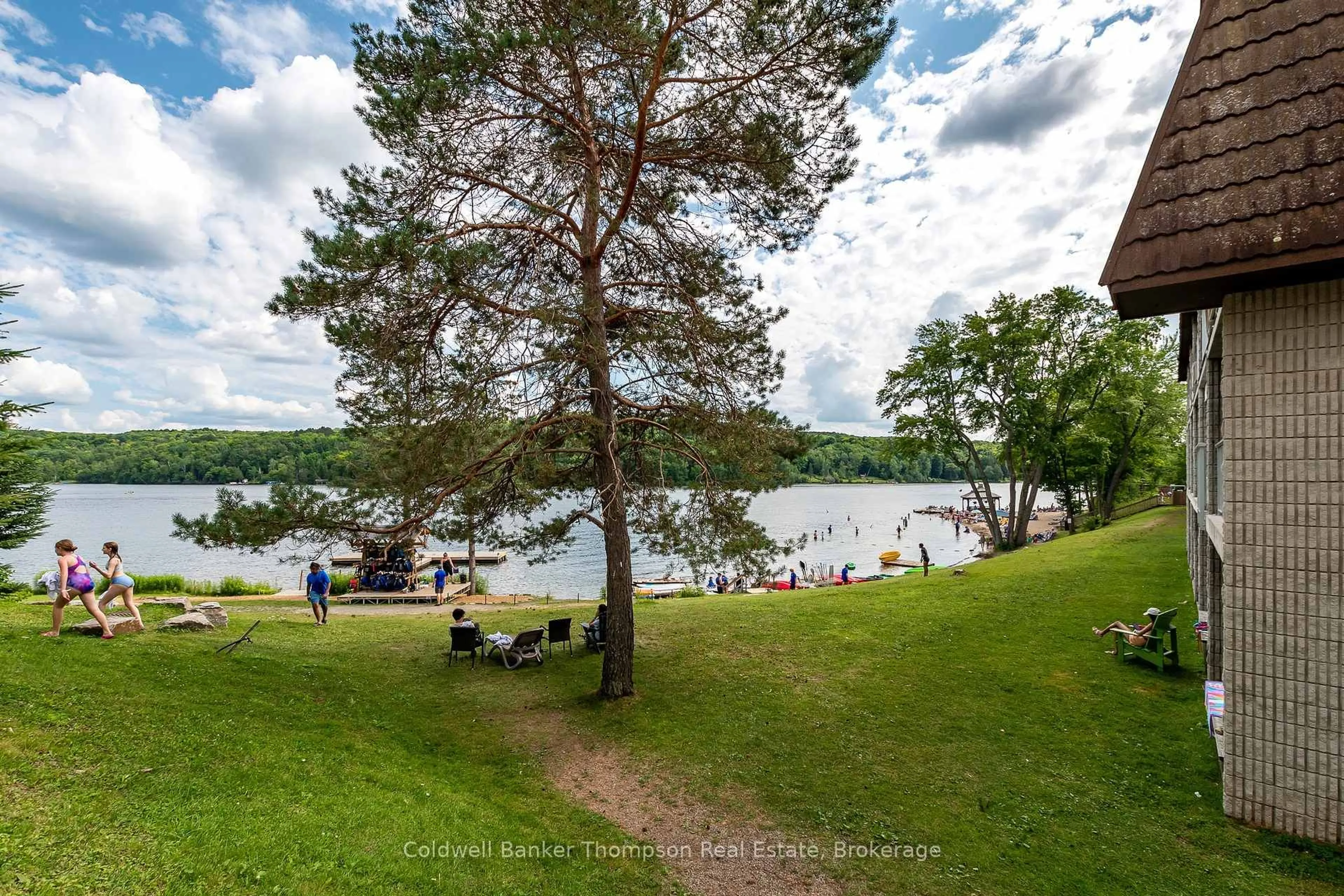 A pic from outside/outdoor area/front of a property/back of a property/a pic from drone, water/lake/river/ocean view for 1235 Deerhurst Bayshore Dr #423, Huntsville Ontario P1H 1A9