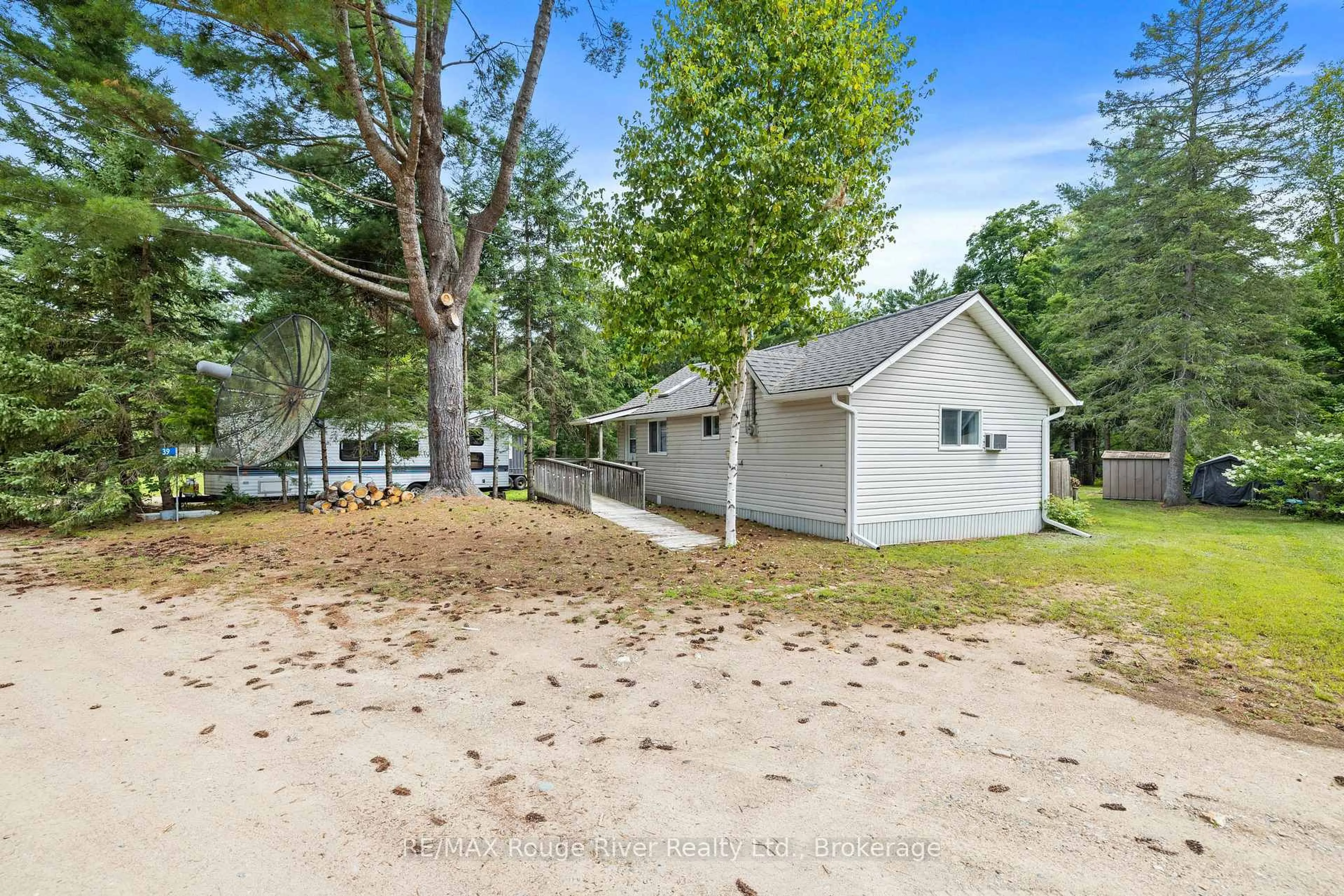 Patio, water/lake/river/ocean view for 39 Hobo Lane, Bancroft Ontario K0L 1C0