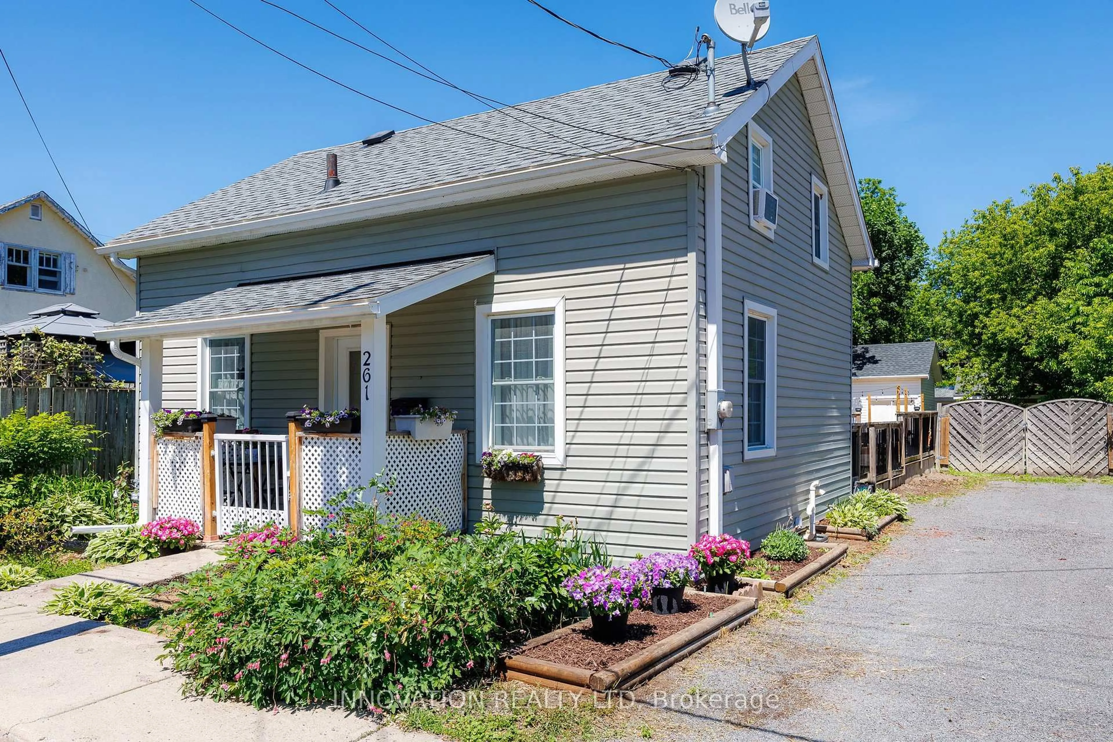 Home with vinyl exterior material, street for 261 St-Paul St, Perth Ontario K7C 3C7