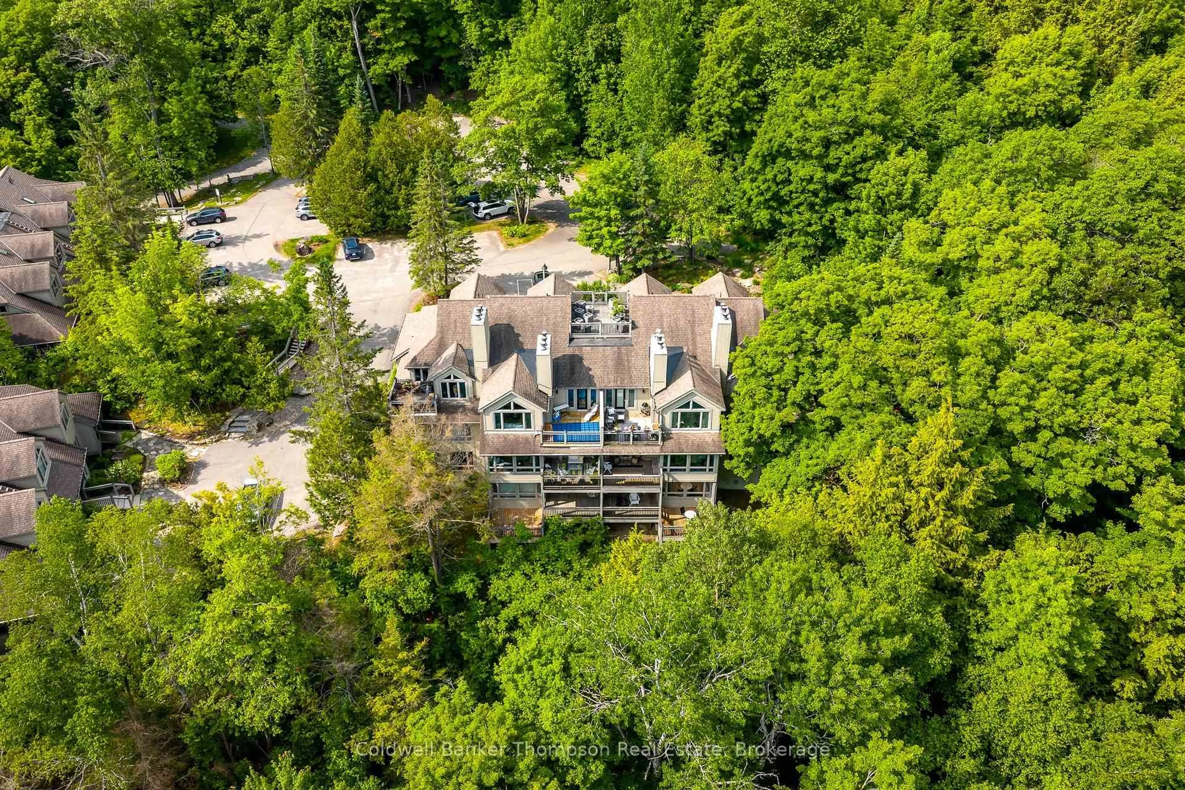 A pic from outside/outdoor area/front of a property/back of a property/a pic from drone, forest/trees view for 3931 Grandview Forest Hill Dr, Huntsville Ontario P1H 2N5