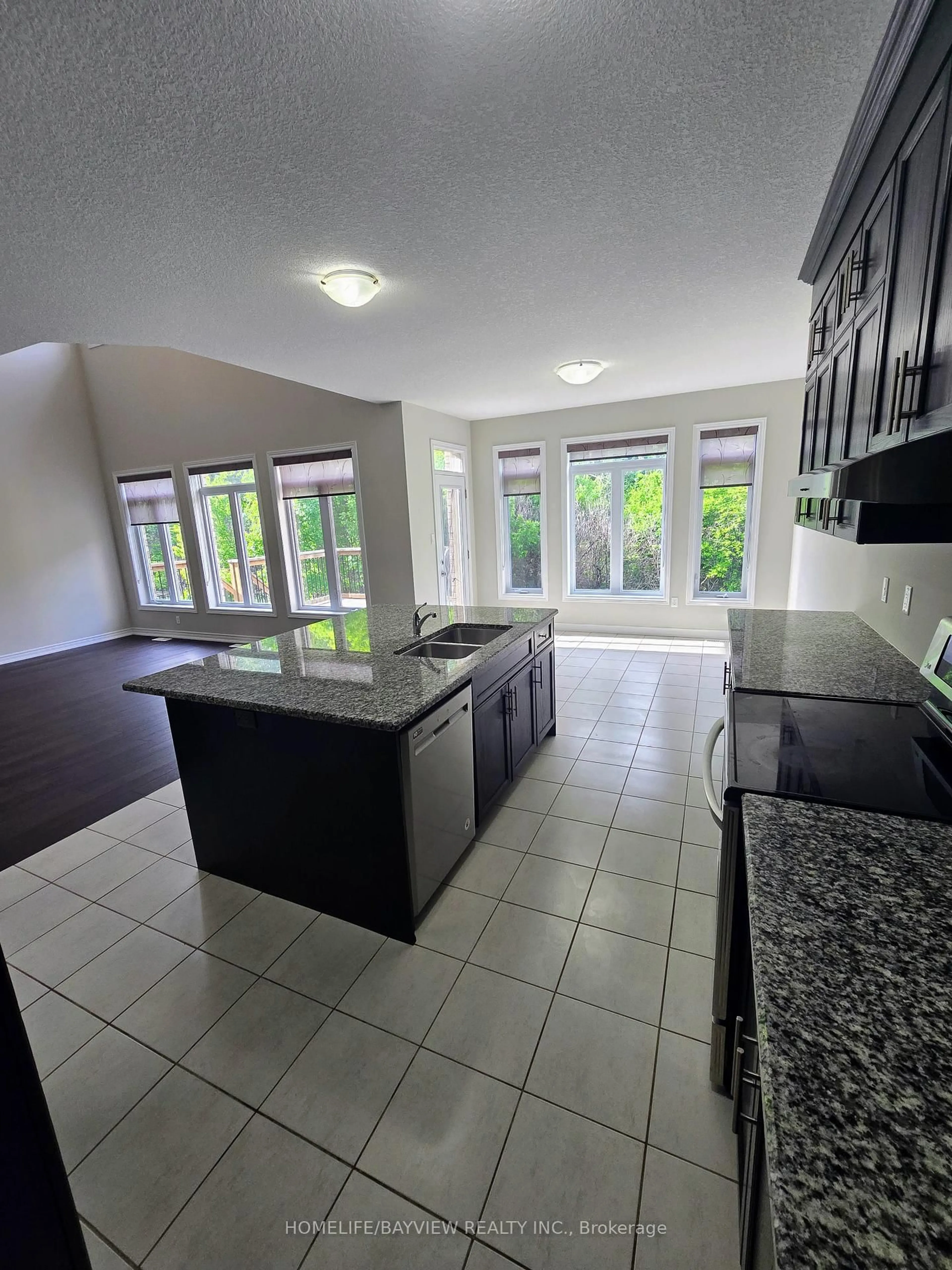 Open concept kitchen, ceramic/tile floor for 65 Westra Dr, Guelph Ontario N1K 1Z7