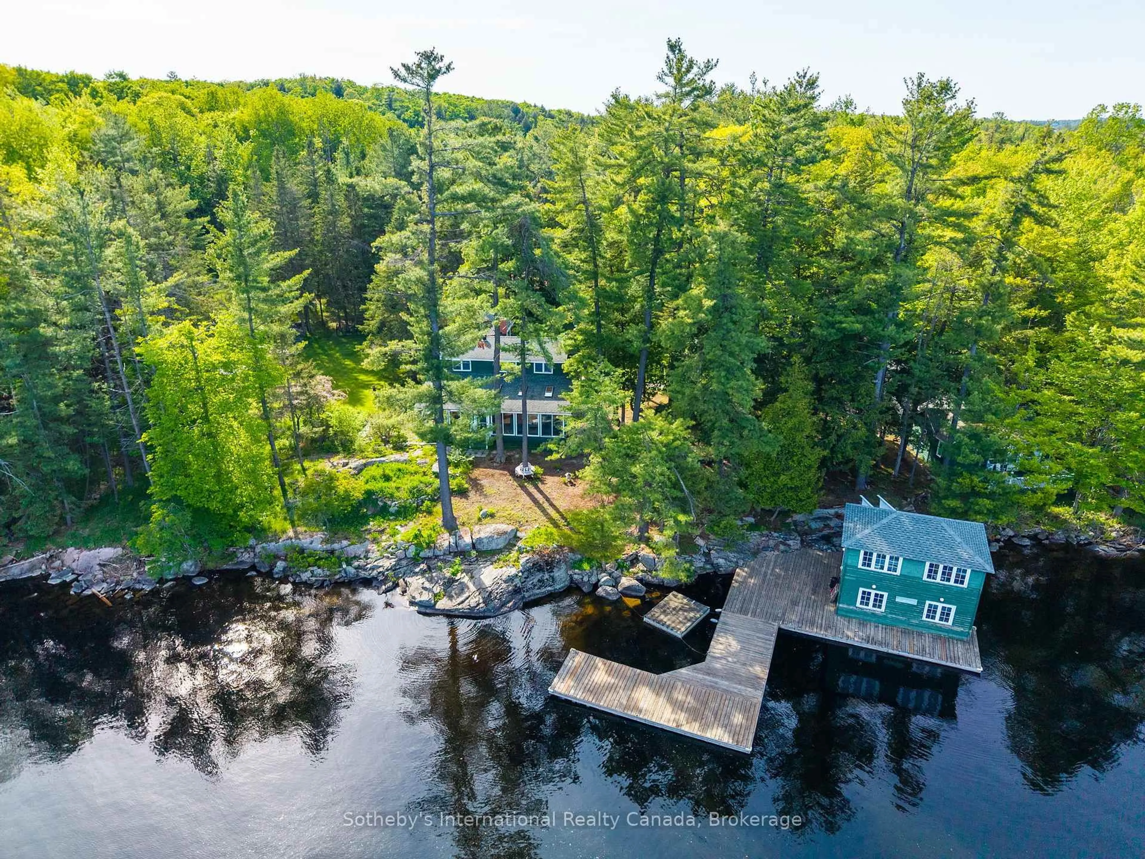 A pic from outside/outdoor area/front of a property/back of a property/a pic from drone, water/lake/river/ocean view for 1132 Greenwood Point Dr #1, Muskoka Lakes Ontario P1P 1R2