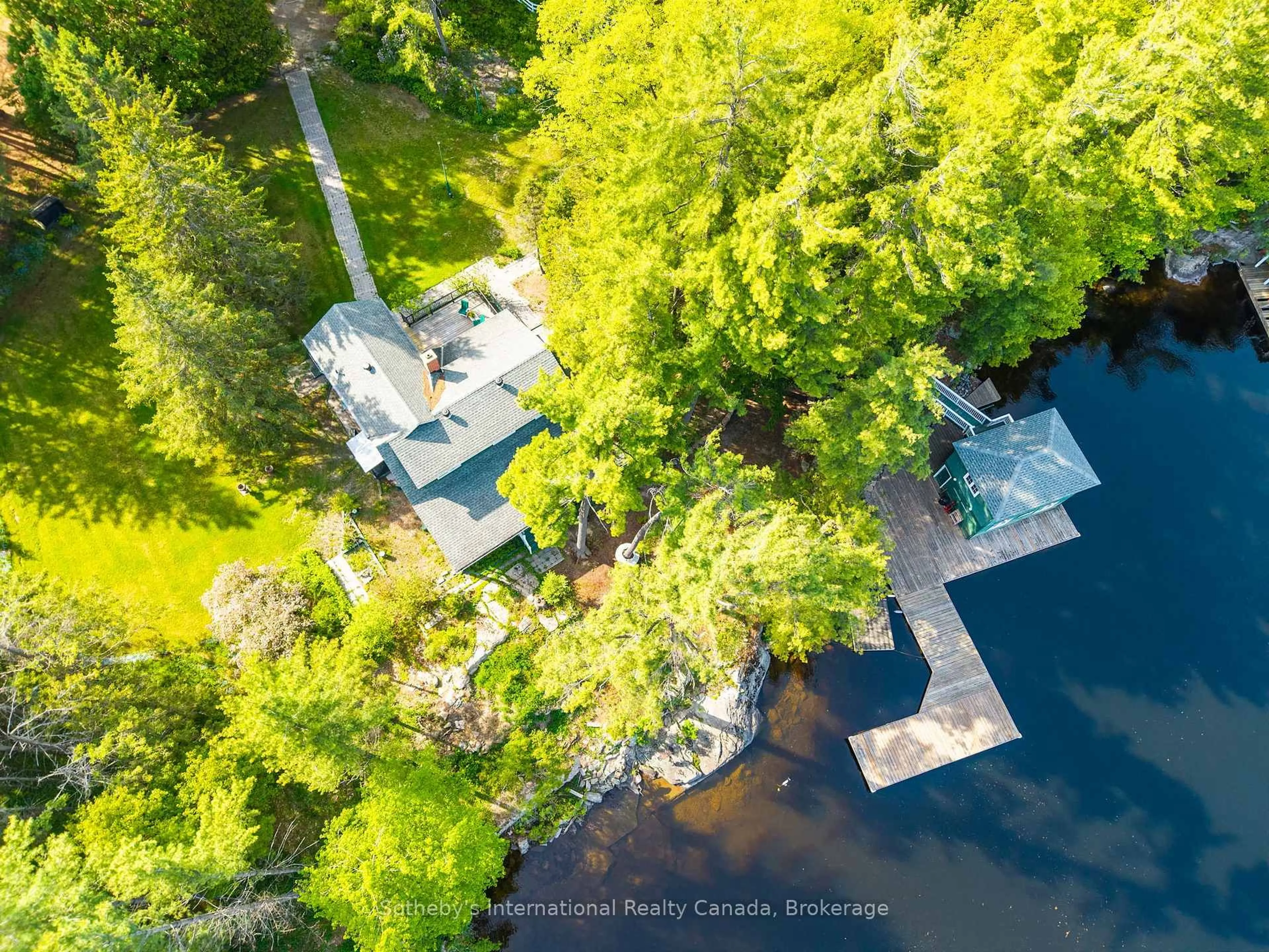 A pic from outside/outdoor area/front of a property/back of a property/a pic from drone, water/lake/river/ocean view for 1132 Greenwood Point Dr #1, Muskoka Lakes Ontario P1P 1R2