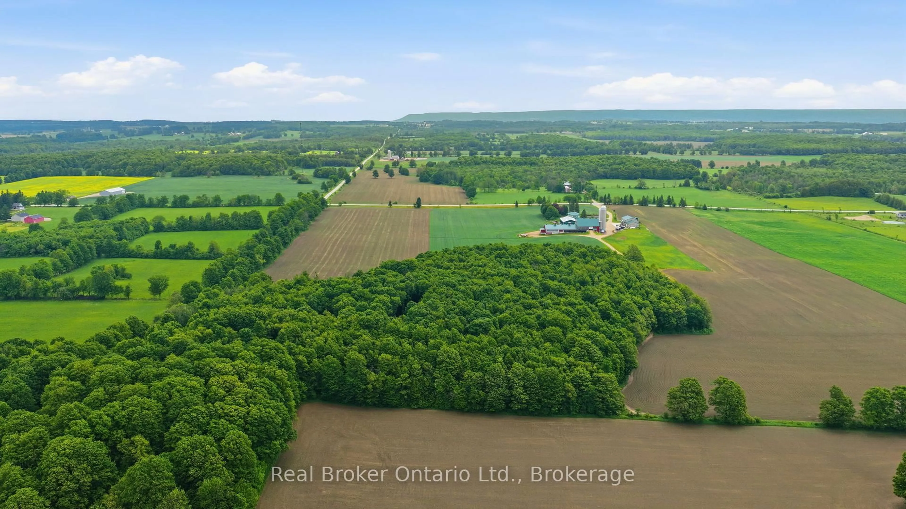 A pic from outside/outdoor area/front of a property/back of a property/a pic from drone, water/lake/river/ocean view for 805500 Sideroad 25, Grey Highlands Ontario N4L 1W6