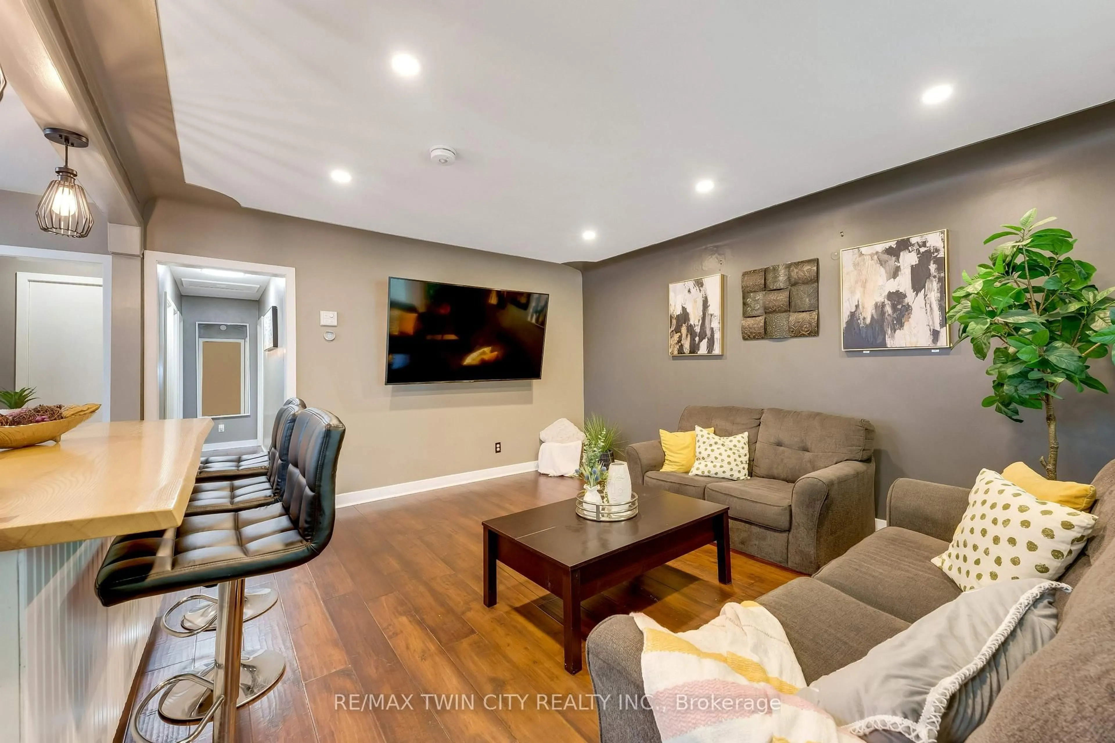 Living room with furniture, wood/laminate floor for 90 Arlington Blvd, Kitchener Ontario N2A 2G9