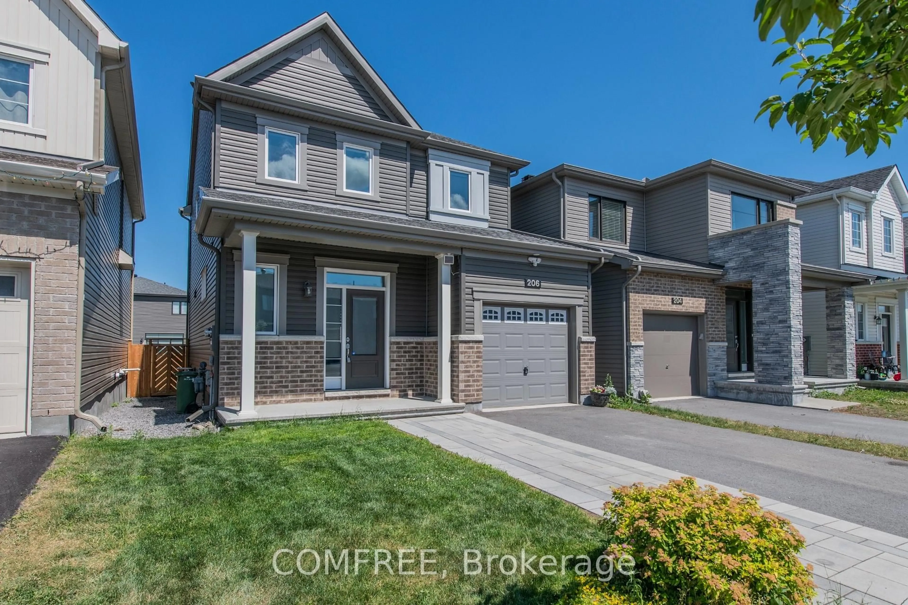 Home with brick exterior material, street for 206 Kimpton Dr, Ottawa Ontario K2S 2H9