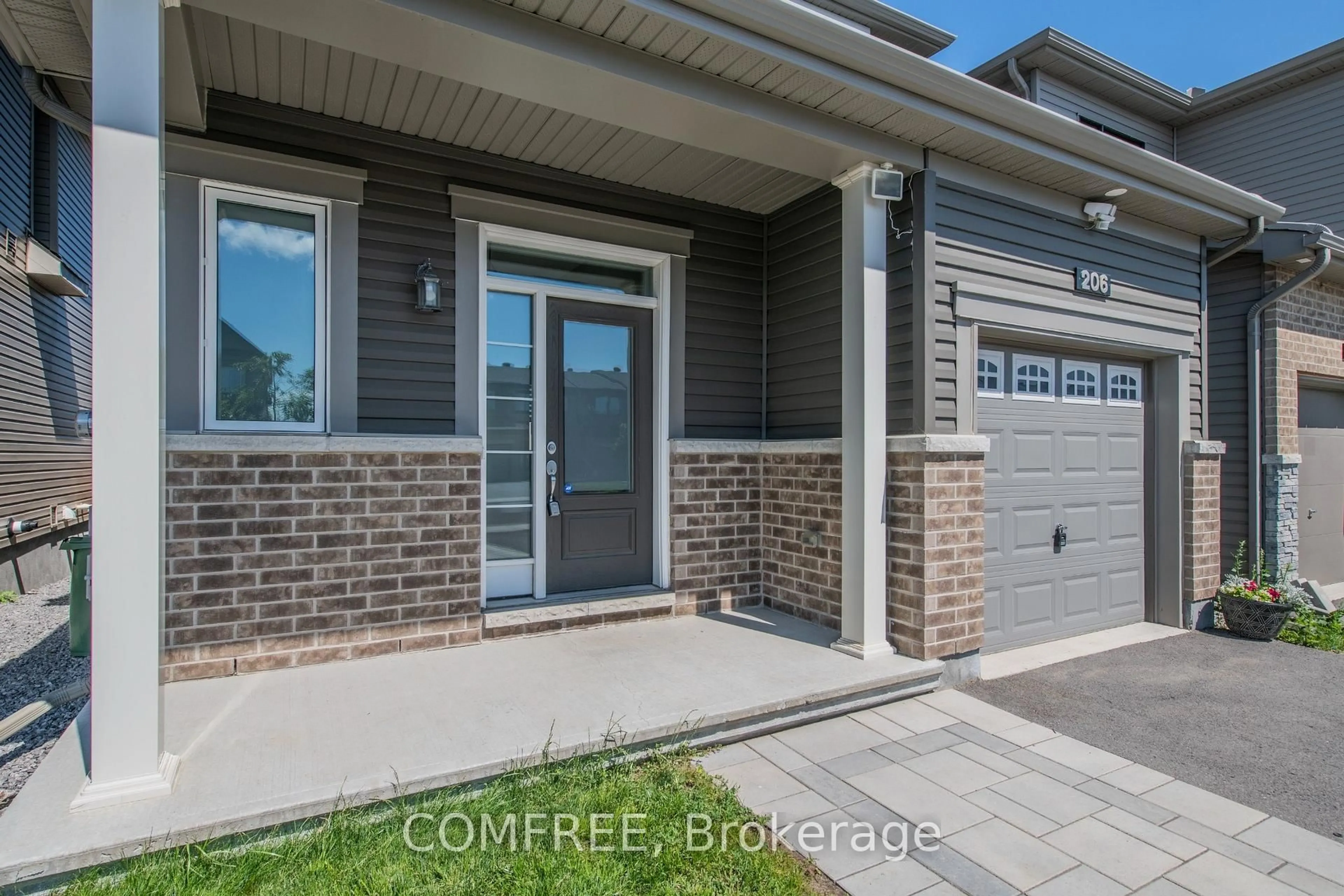 Home with brick exterior material, street for 206 Kimpton Dr, Ottawa Ontario K2S 2H9