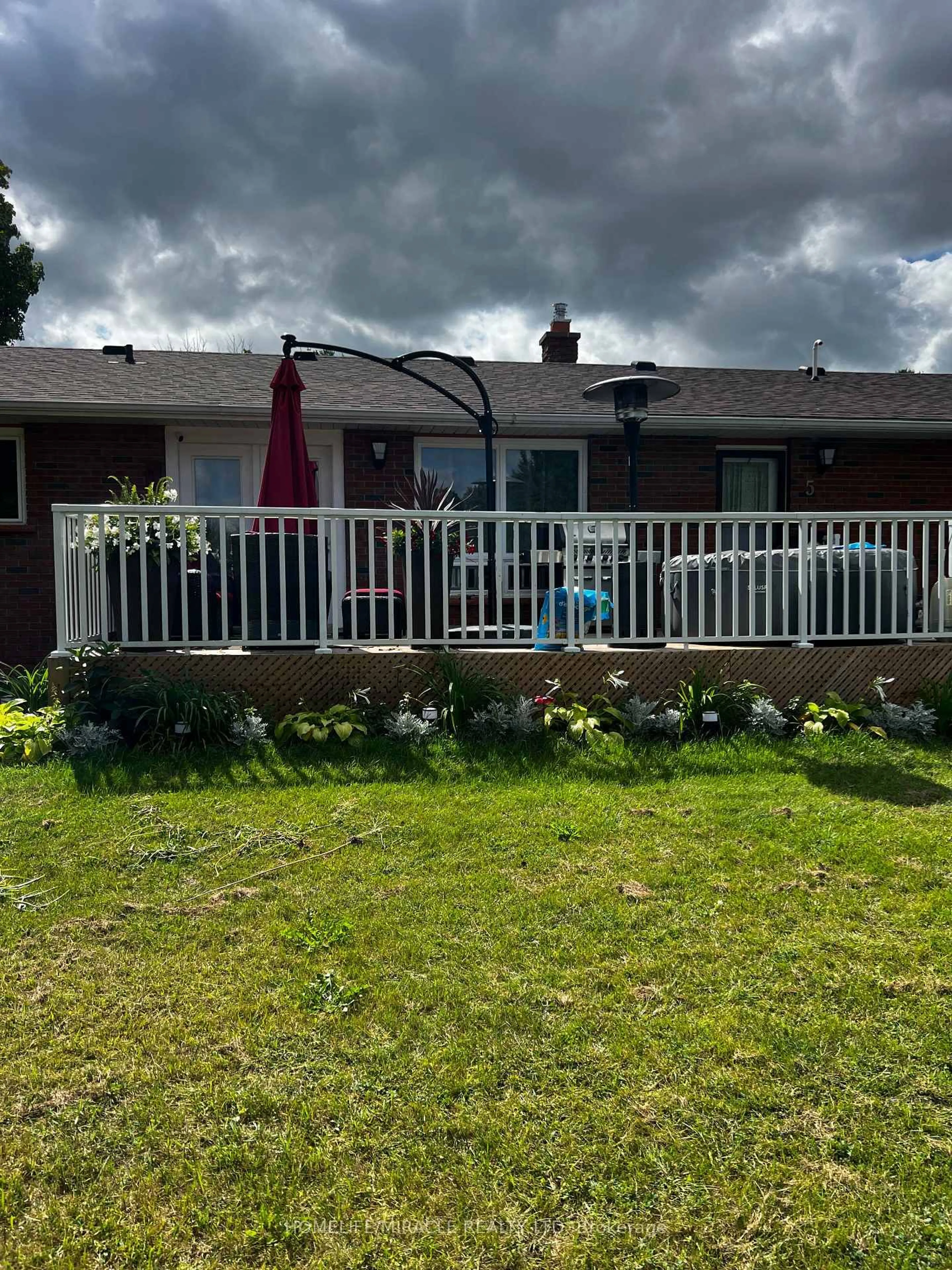 A pic from outside/outdoor area/front of a property/back of a property/a pic from drone, water/lake/river/ocean view for 128 County Rd #22, Alnwick/Haldimand Ontario K0K 1C0