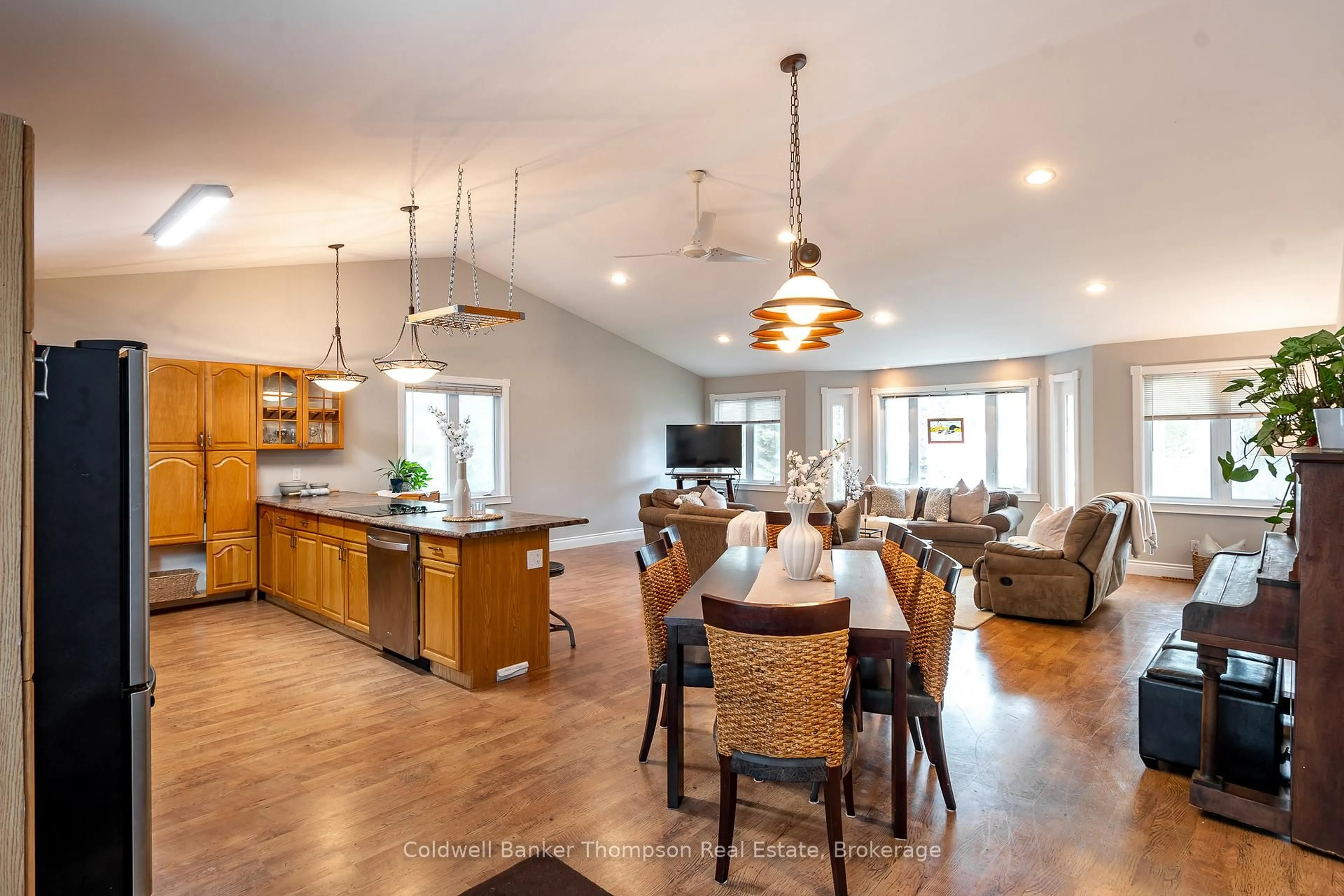 Open concept kitchen, wood/laminate floor for 4237 Ravenscliffe Rd, Huntsville Ontario P1H 2J2