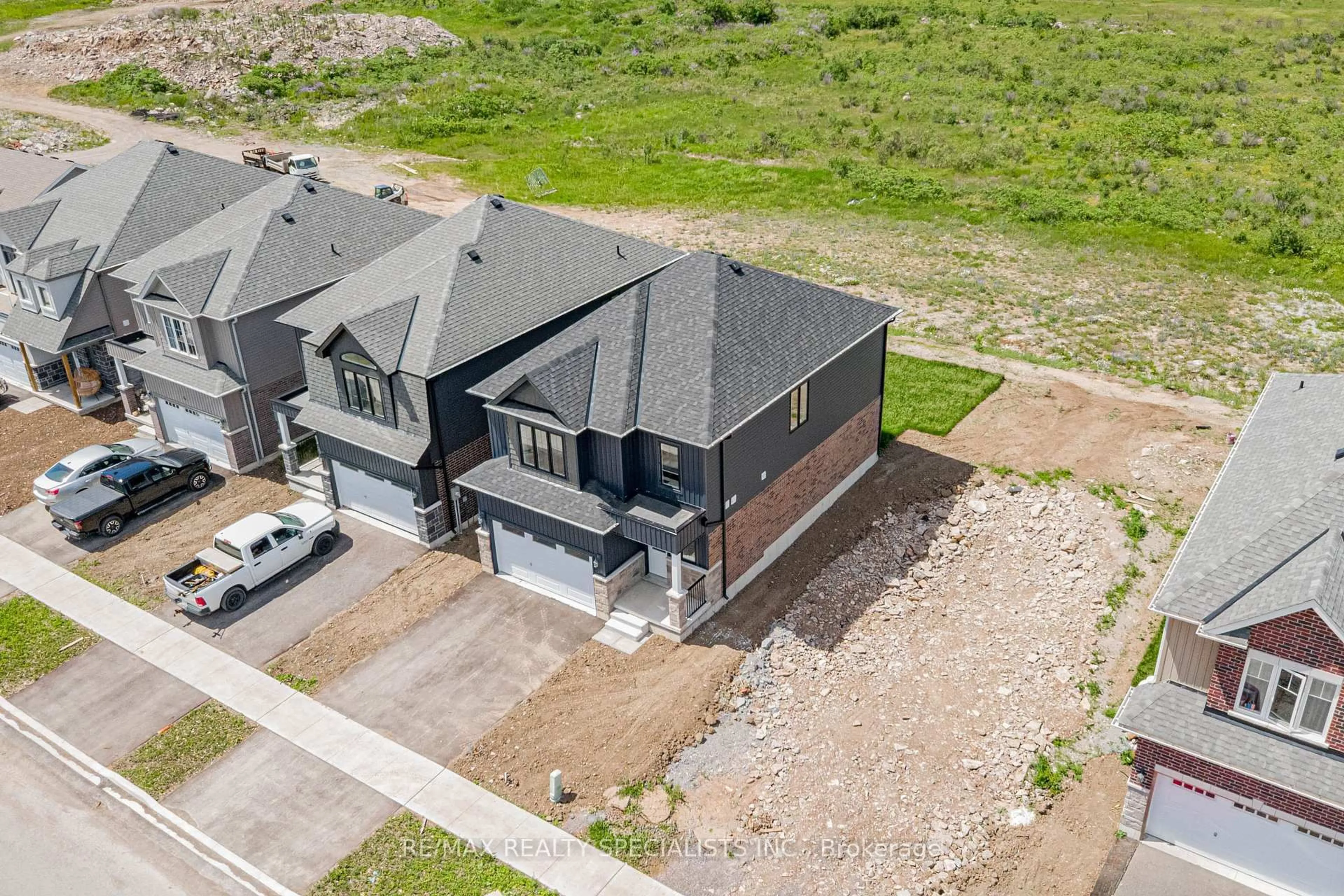A pic from outside/outdoor area/front of a property/back of a property/a pic from drone, unknown for 58 Hillcroft Way, Kawartha Lakes Ontario K0M 1A0