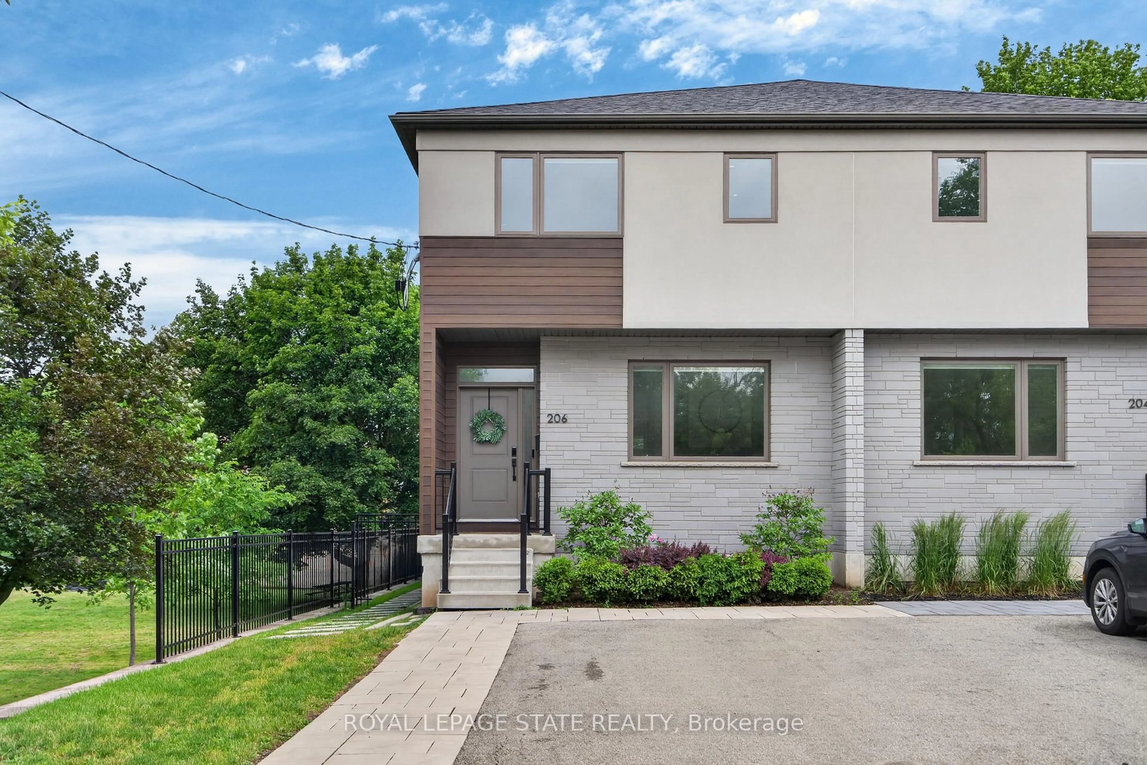 Home with brick exterior material, street for 206 Canada St, Hamilton Ontario L8P 1P6