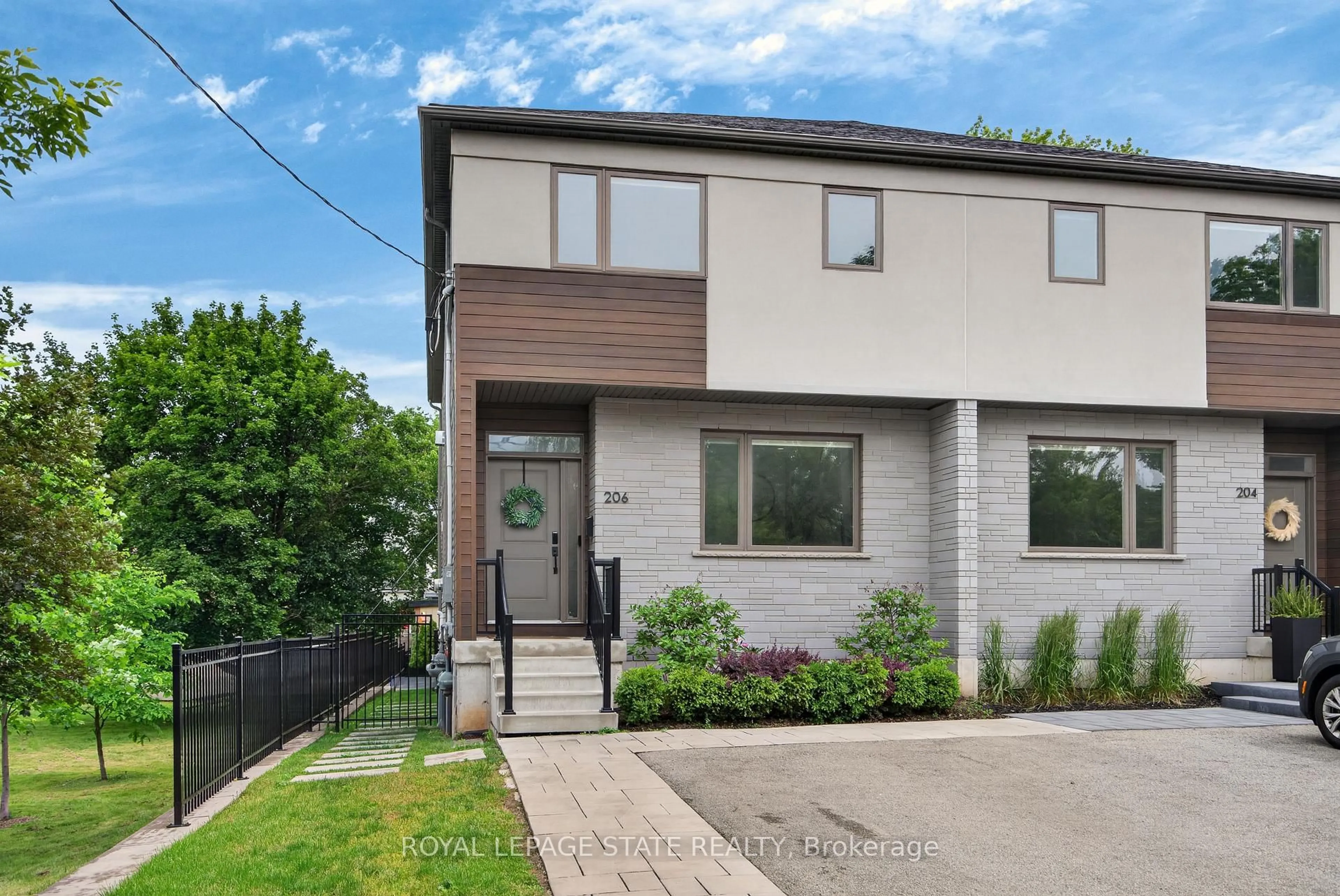Home with brick exterior material, street for 206 Canada St, Hamilton Ontario L8P 1P6