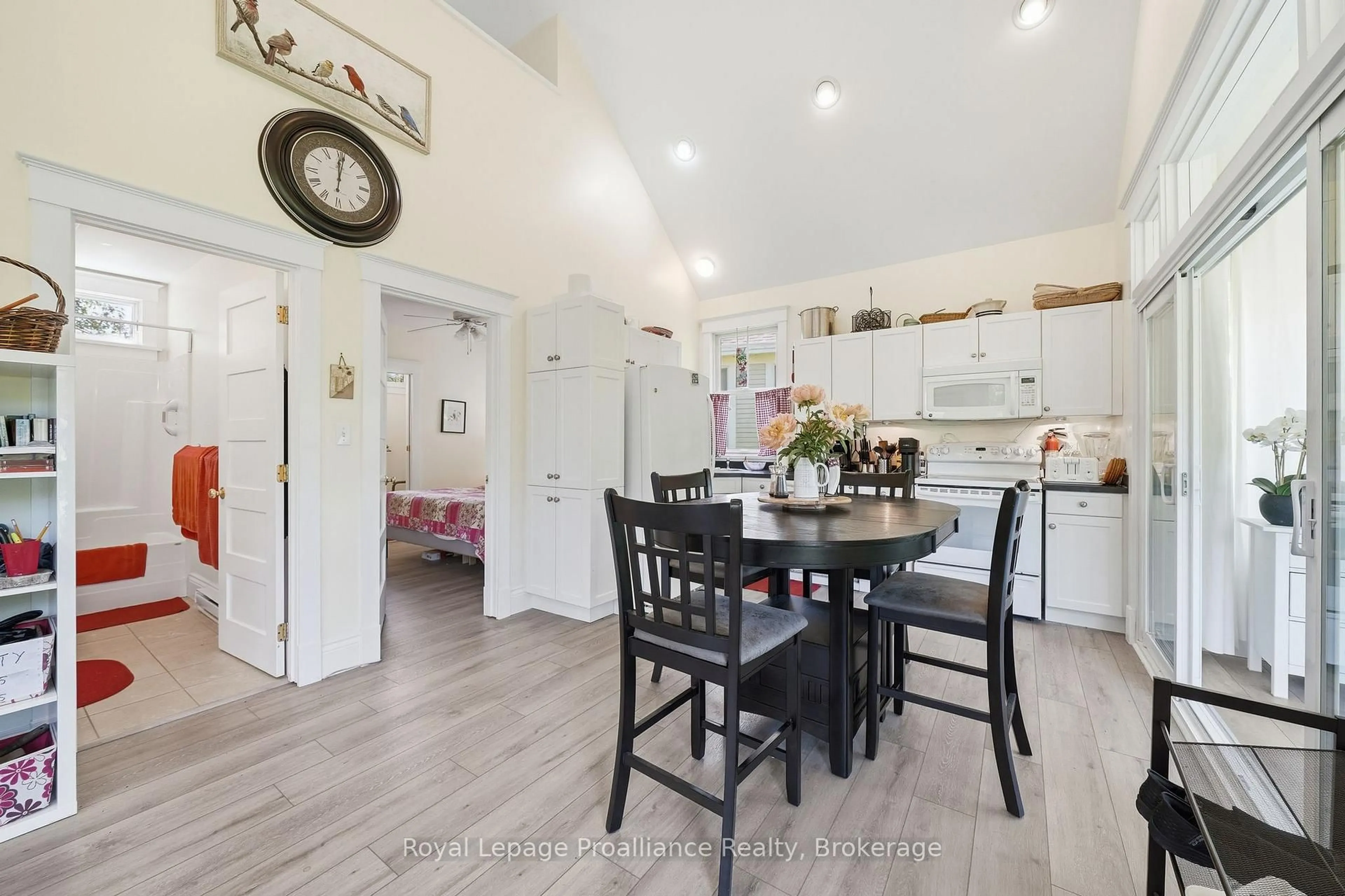 Open concept kitchen, wood/laminate floor for 16 Nature's Lane, Prince Edward County Ontario K8P 0C5