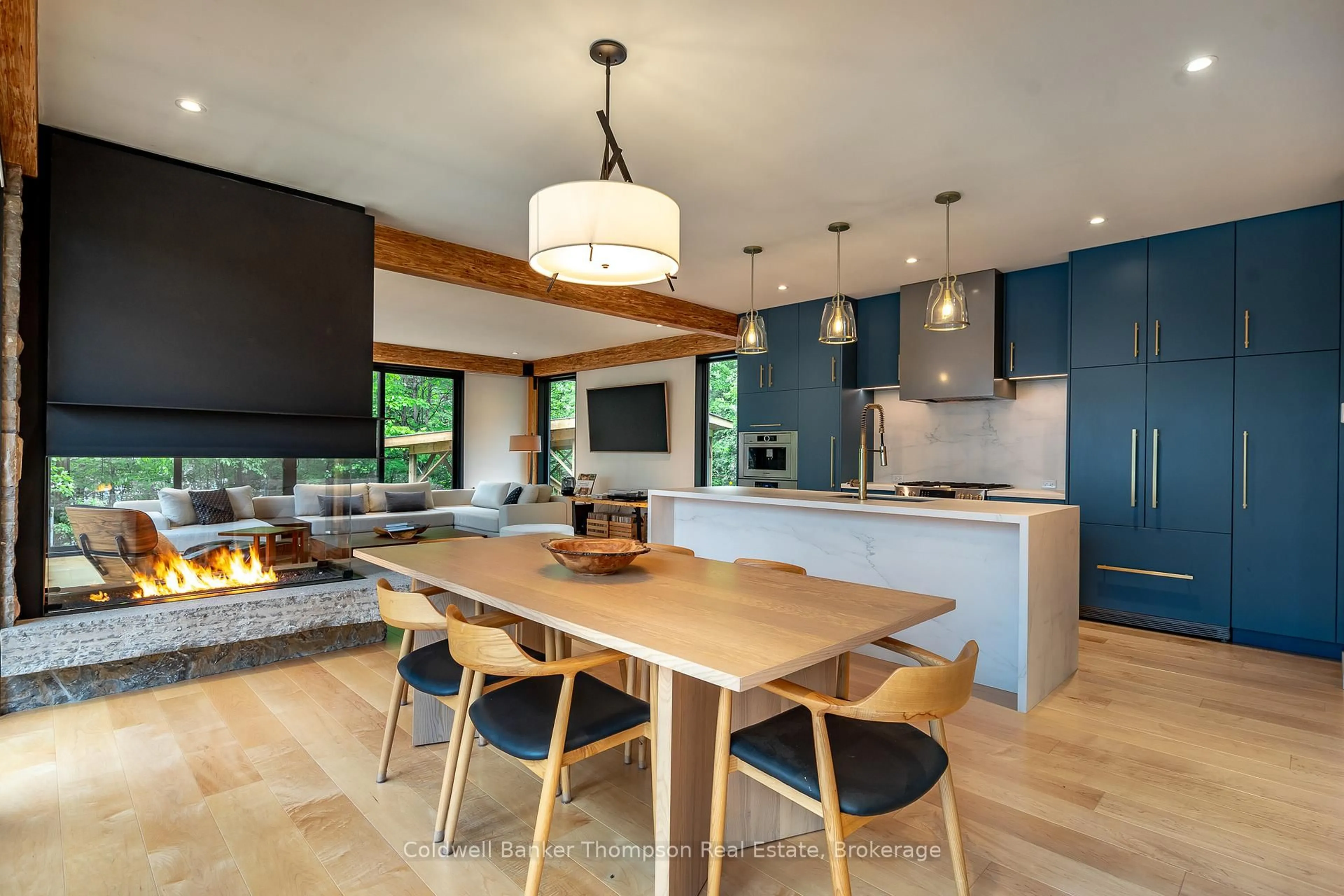 Open concept kitchen, wood/laminate floor for 1558 South Lancelot Rd, Huntsville Ontario P0B 1M0