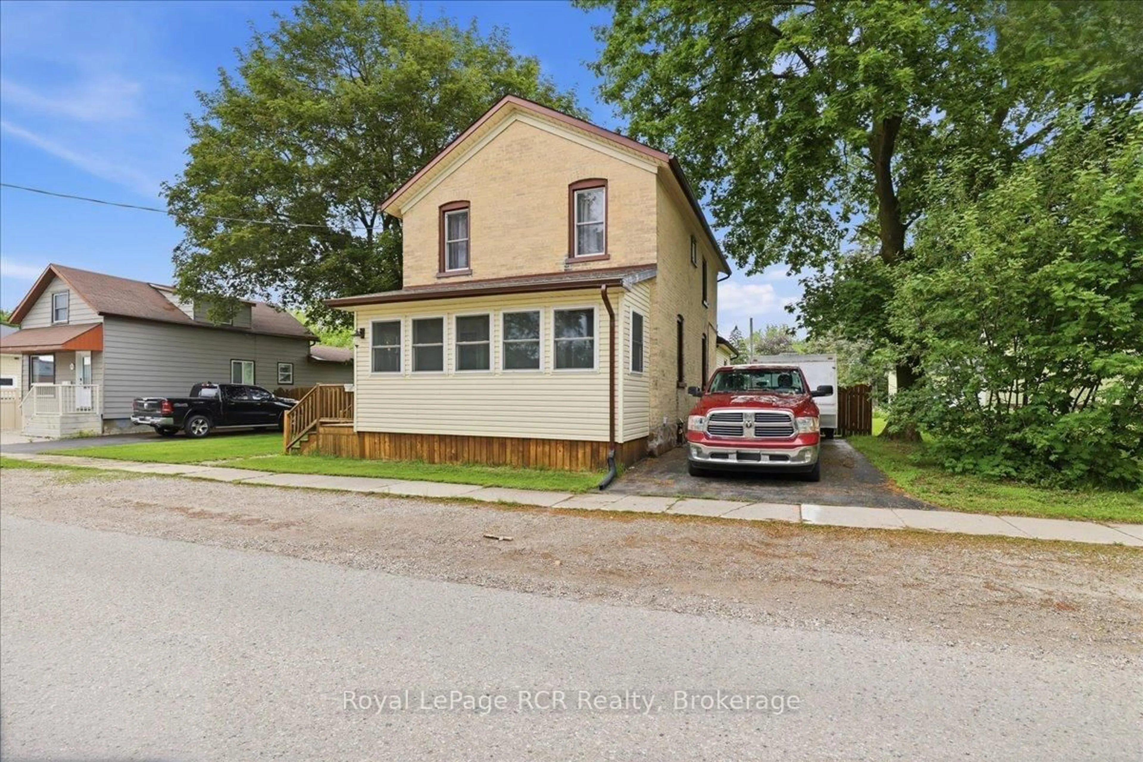 A pic from outside/outdoor area/front of a property/back of a property/a pic from drone, street for 161 Livingstone Ave, North Perth Ontario N4W 1P6