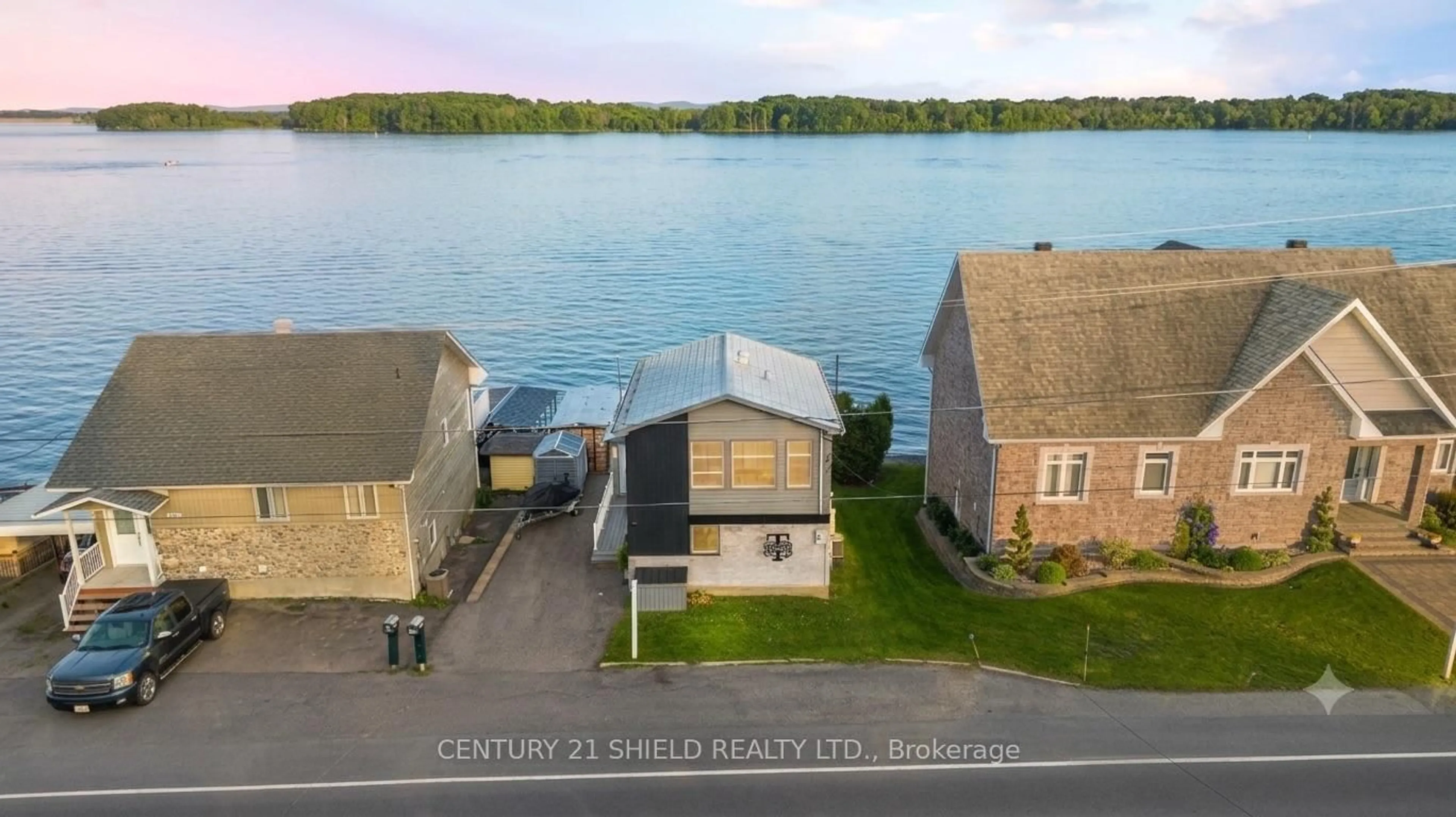 A pic from outside/outdoor area/front of a property/back of a property/a pic from drone, water/lake/river/ocean view for 18438 COUNTY RD 2 Rd, South Glengarry Ontario K6H 5R1