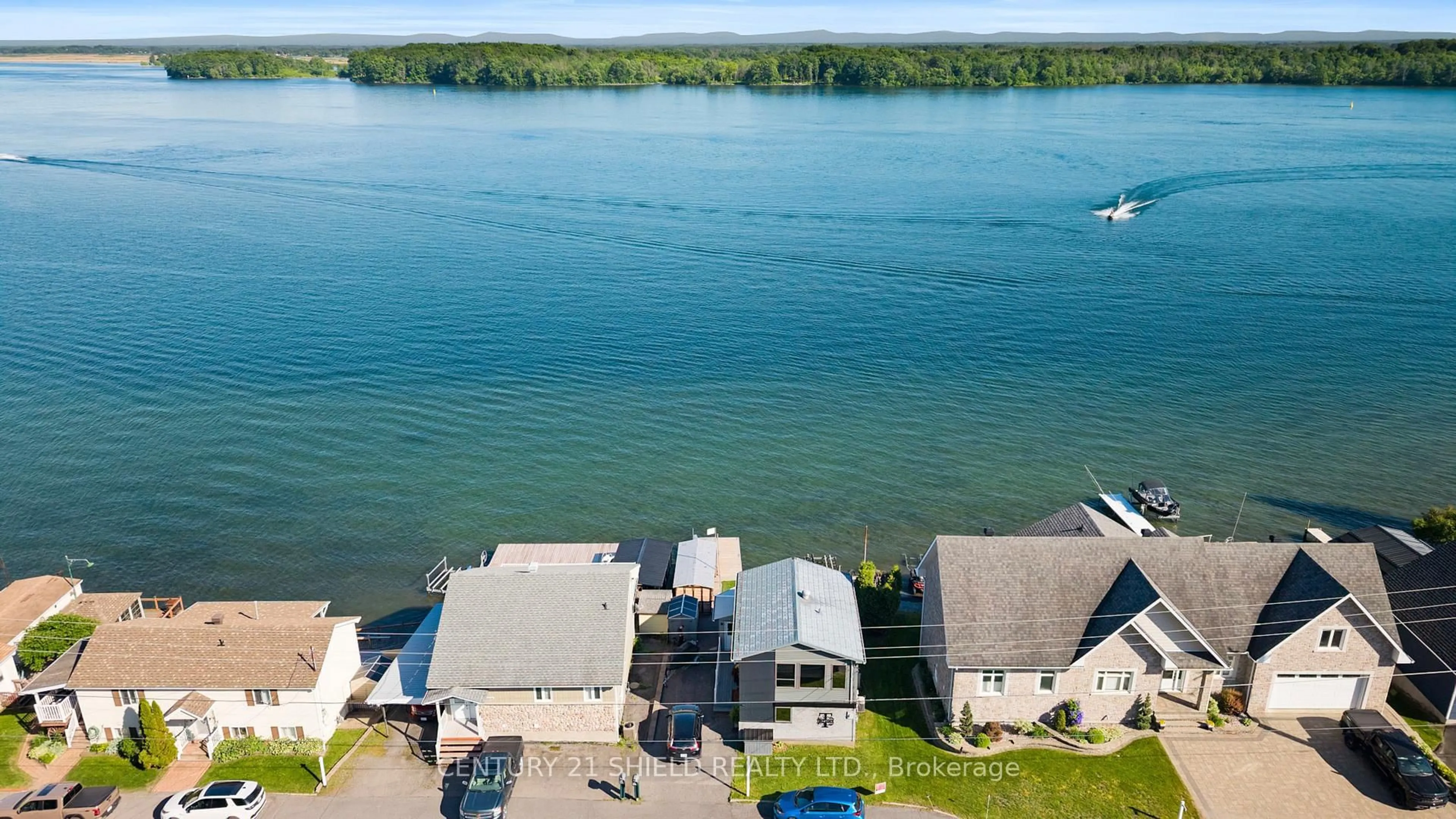 A pic from outside/outdoor area/front of a property/back of a property/a pic from drone, water/lake/river/ocean view for 18438 COUNTY RD 2 Rd, South Glengarry Ontario K6H 5R1