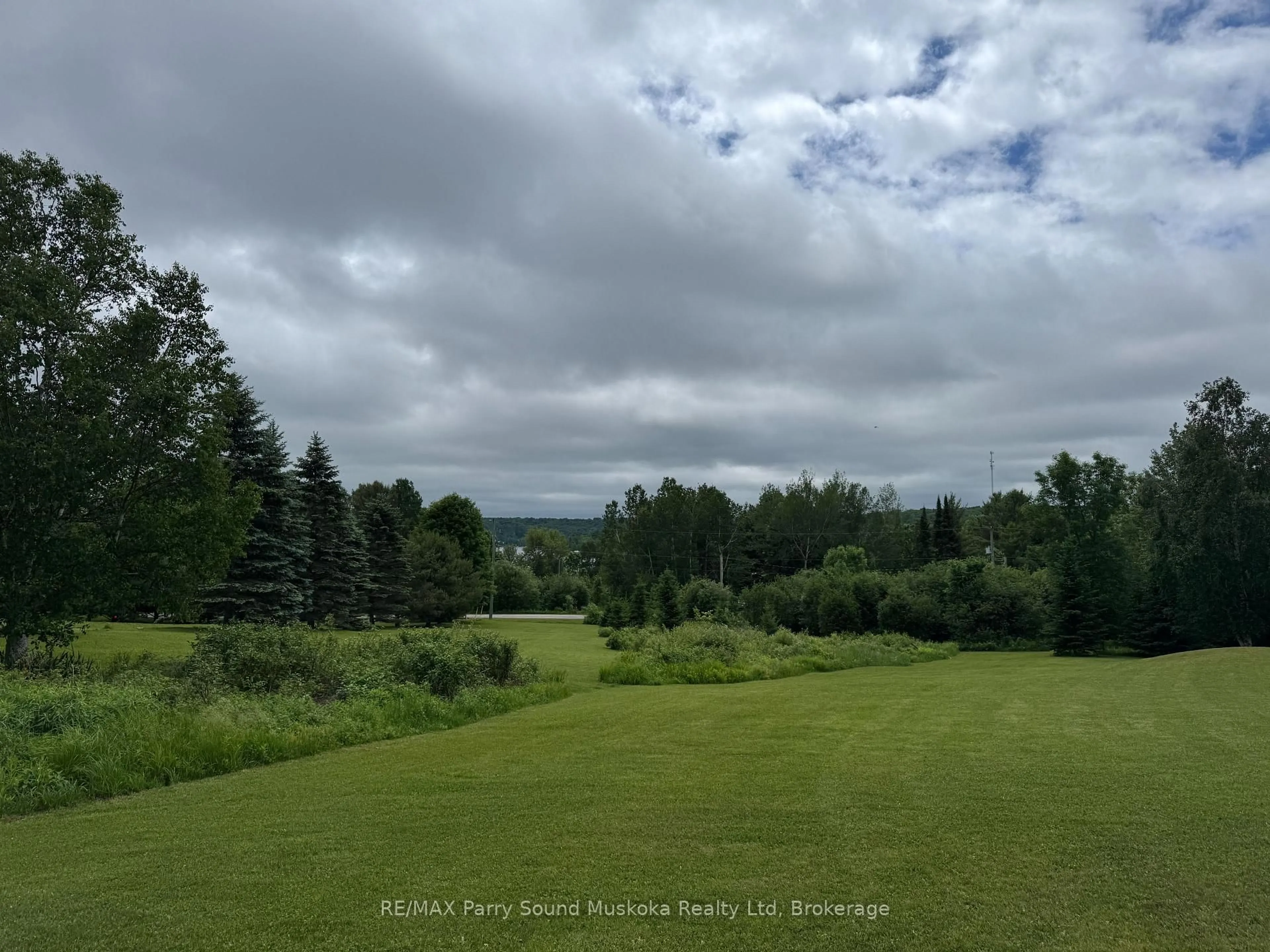 A pic from outside/outdoor area/front of a property/back of a property/a pic from drone, forest/trees view for 135 Daniel Dr, Parry Sound Remote Area Ontario P0H 2R0