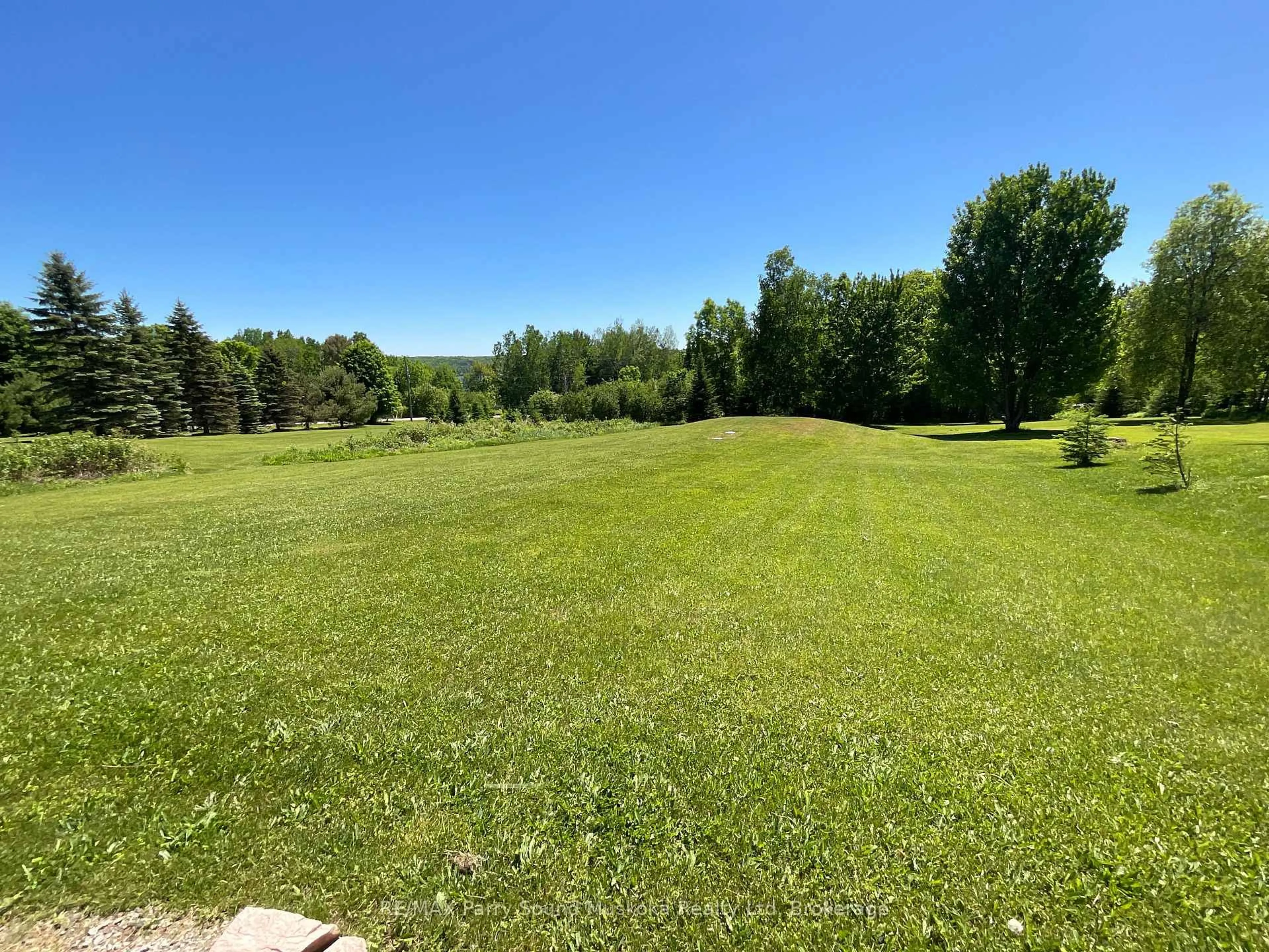 A pic from outside/outdoor area/front of a property/back of a property/a pic from drone, forest/trees view for 135 Daniel Dr, Parry Sound Remote Area Ontario P0H 2R0