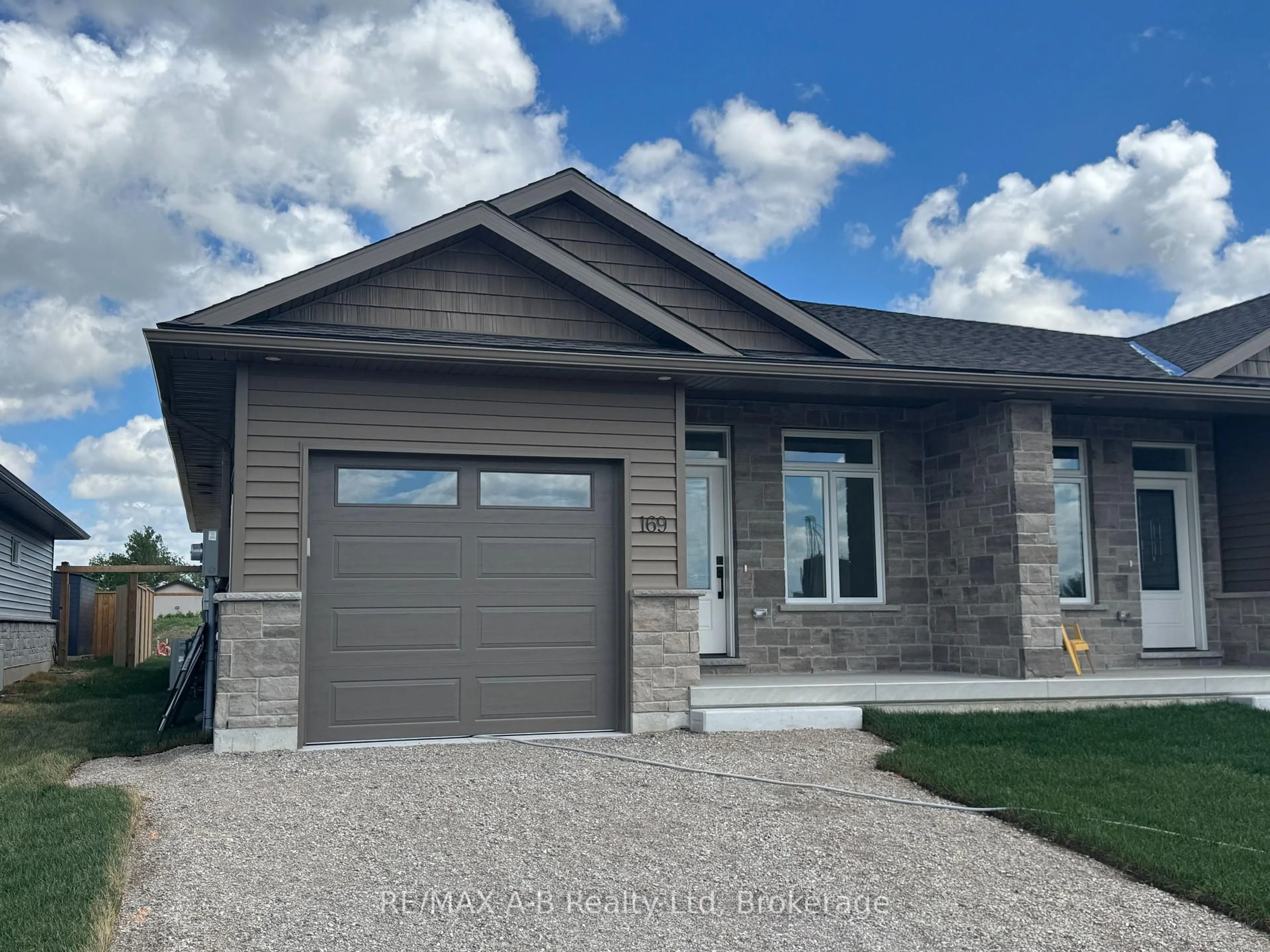 Home with vinyl exterior material, street for 169 Wimpole St, West Perth Ontario N0K 1N0
