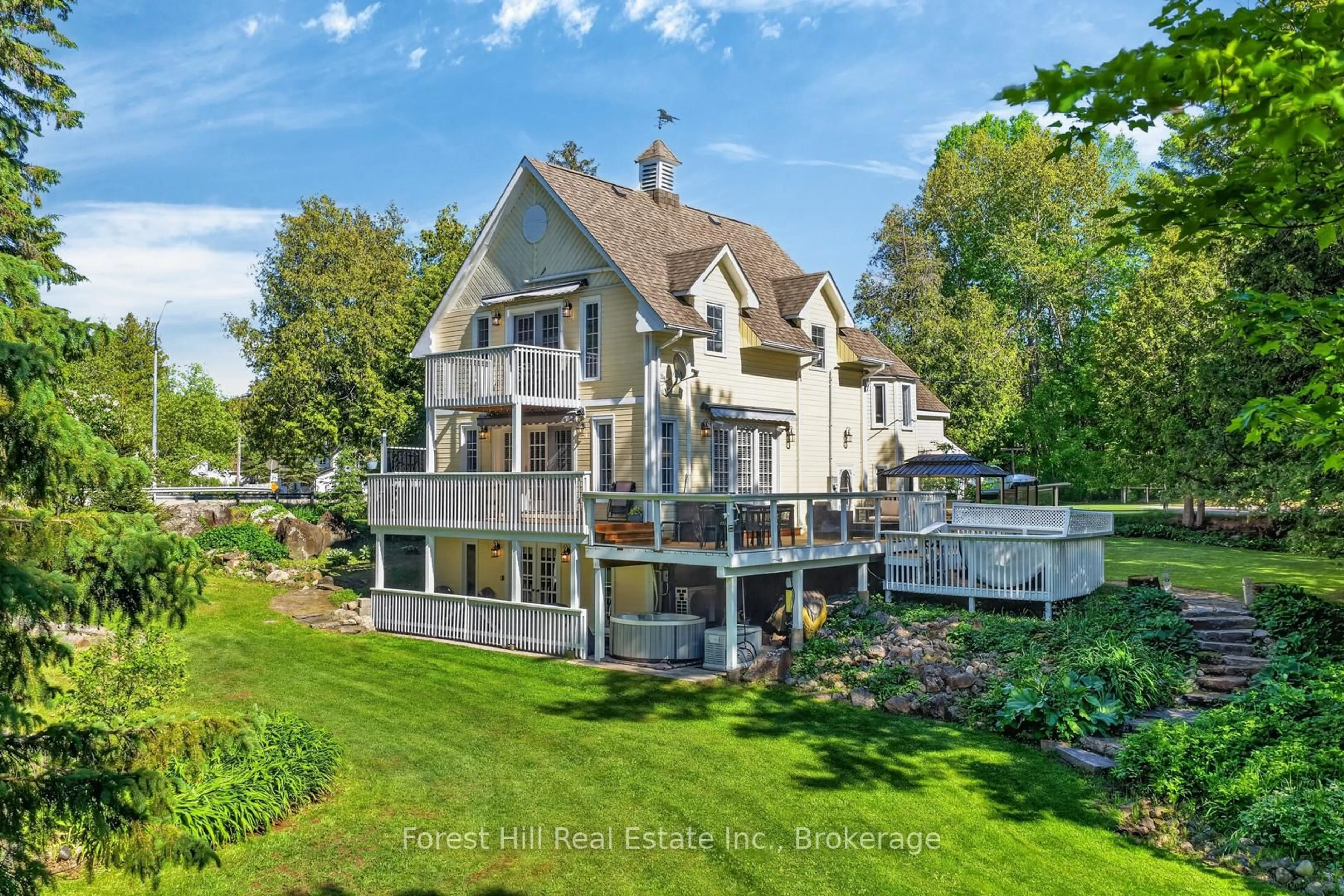 A pic from outside/outdoor area/front of a property/back of a property/a pic from drone, water/lake/river/ocean view for 1029 Harvey Ave, Algonquin Highlands Ontario P0A 1E0