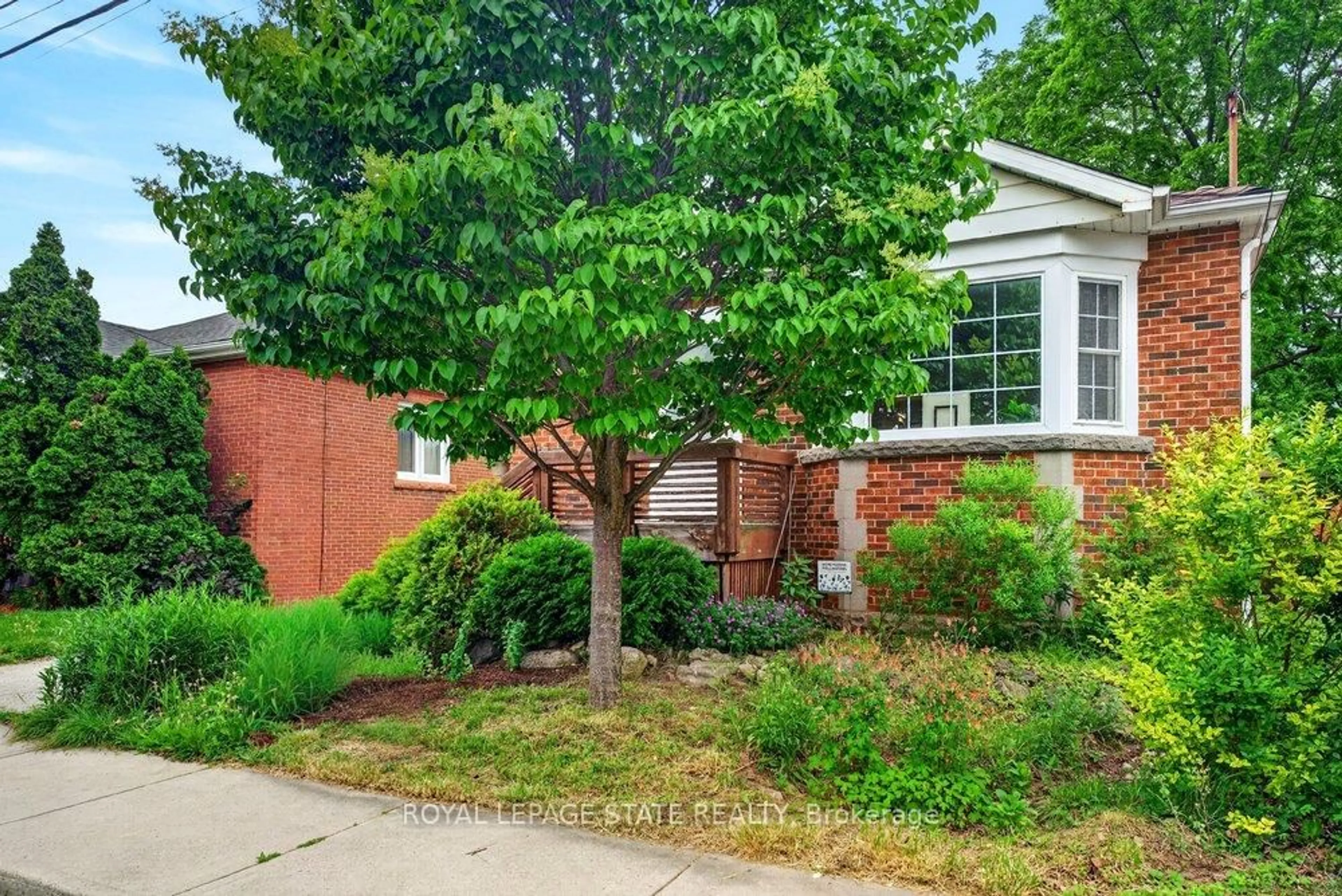 Home with brick exterior material, street for 78 East 14th St, Hamilton Ontario L9A 4B5