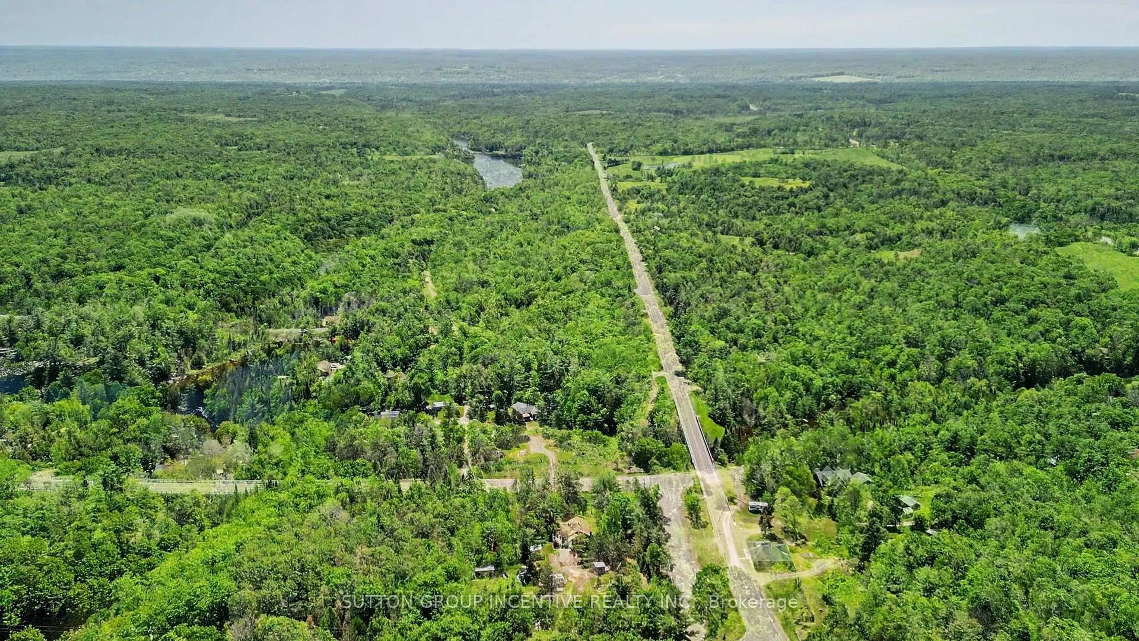 A pic from outside/outdoor area/front of a property/back of a property/a pic from drone, forest/trees view for 1014 Scotts Dam Rd, Minden Hills Ontario K0M 2K0