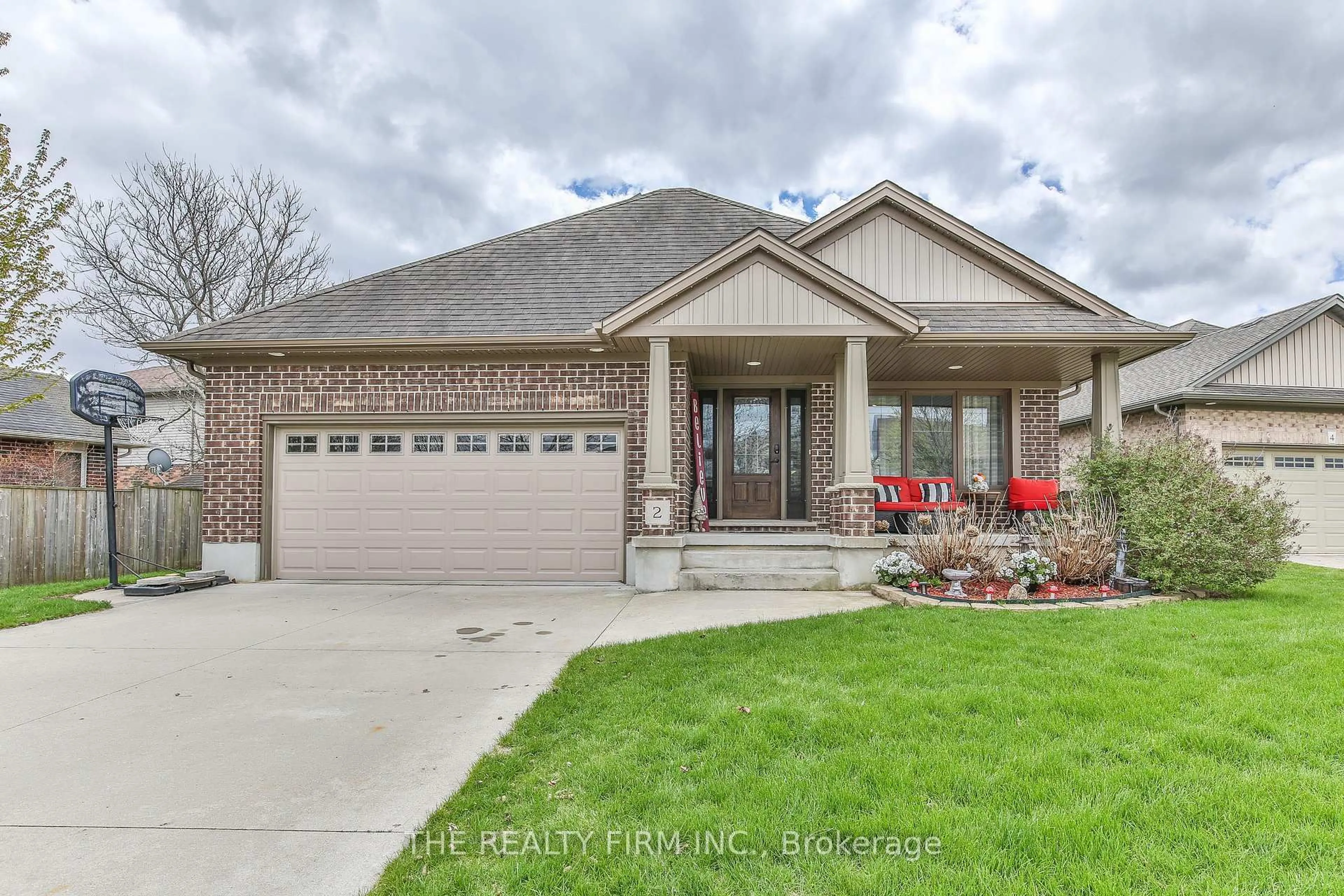 Home with brick exterior material, street for 2 Ambleside Dr, St. Thomas Ontario N5P 0A9