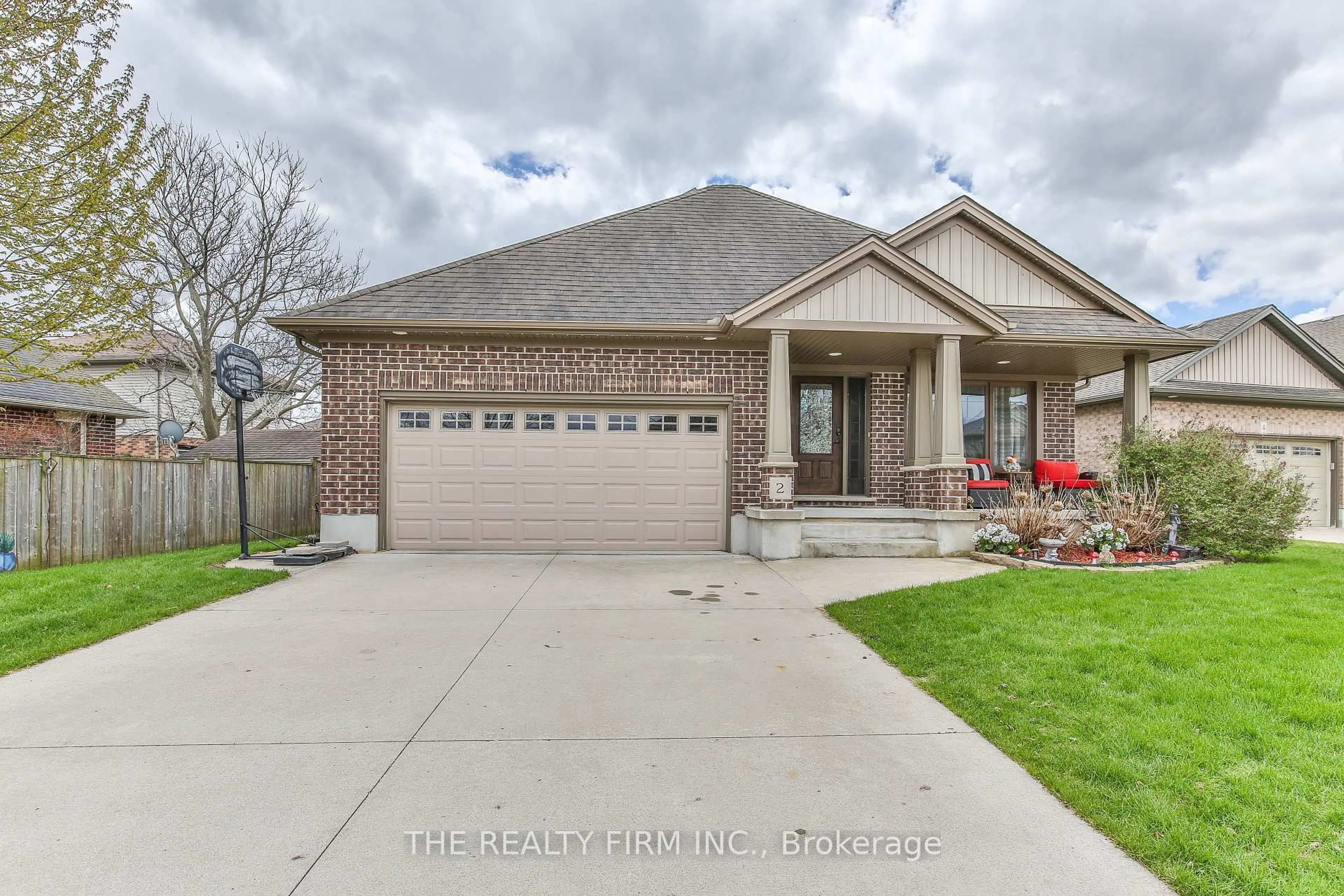 Home with brick exterior material, street for 2 Ambleside Dr, St. Thomas Ontario N5P 0A9