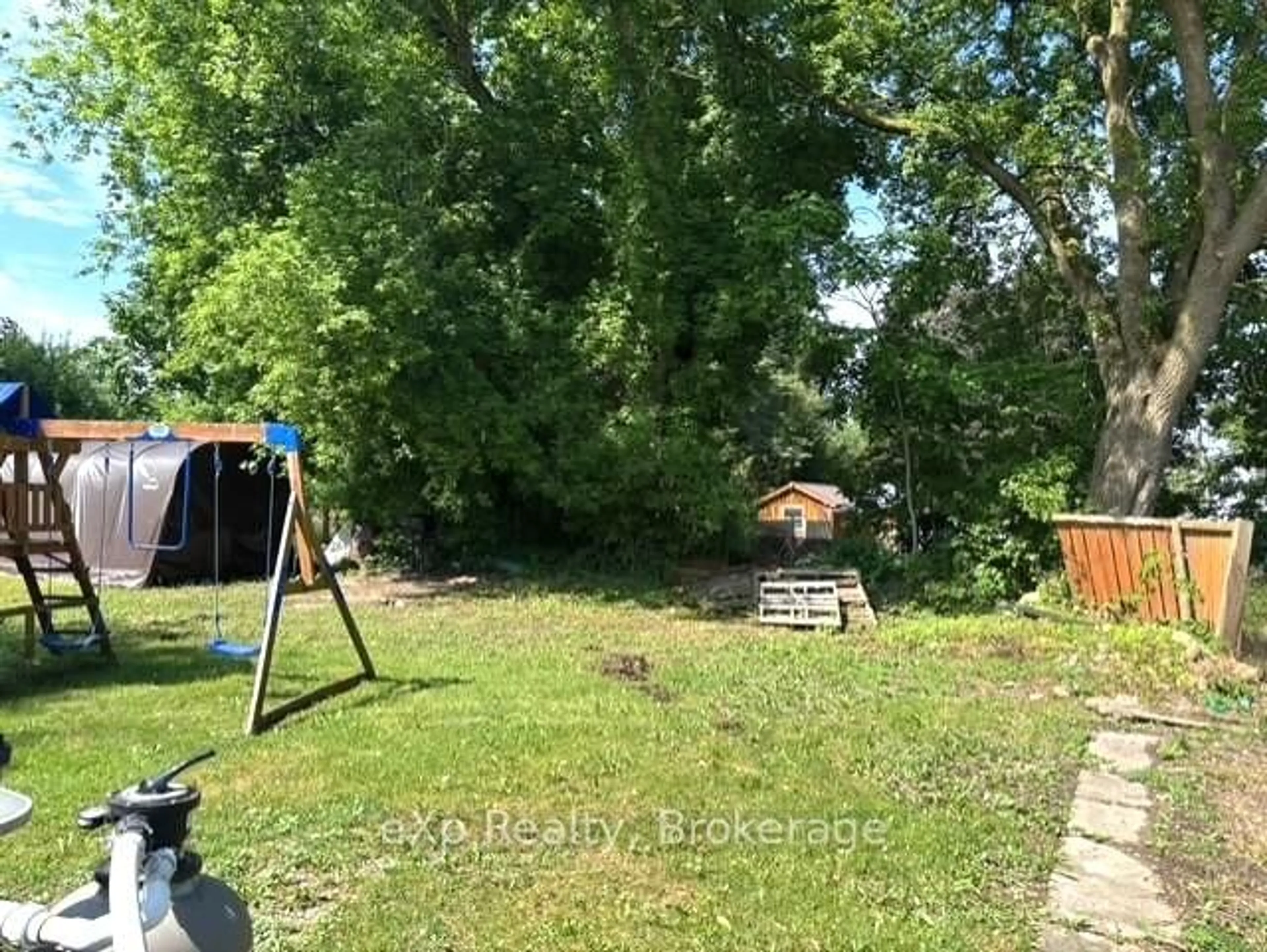 A pic from outside/outdoor area/front of a property/back of a property/a pic from drone, forest/trees view for 8 Main St, Brockton Ontario N0G 1S0