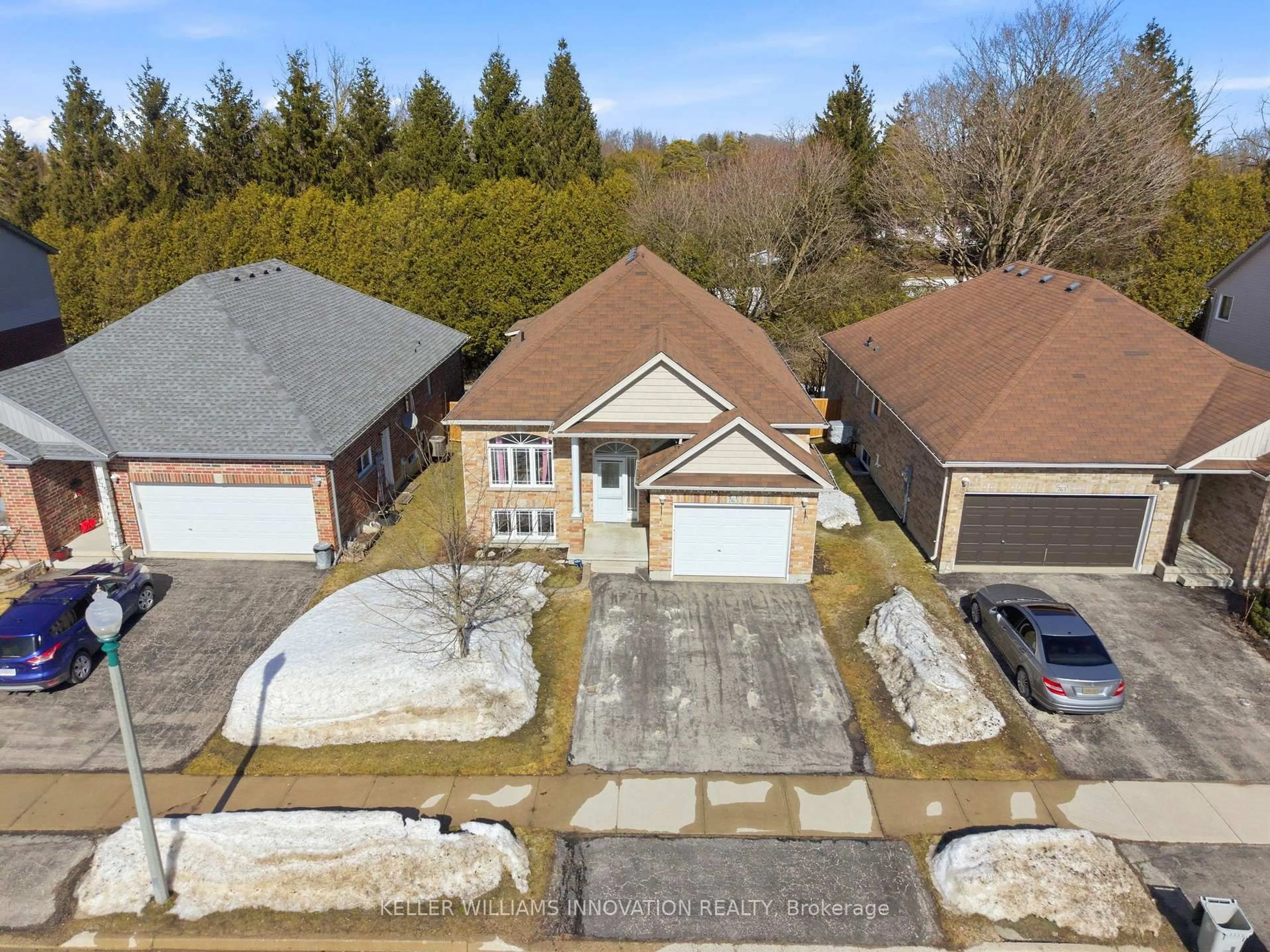 A pic from outside/outdoor area/front of a property/back of a property/a pic from drone, street for 765 Reid Cres, North Perth Ontario N4W 0A2
