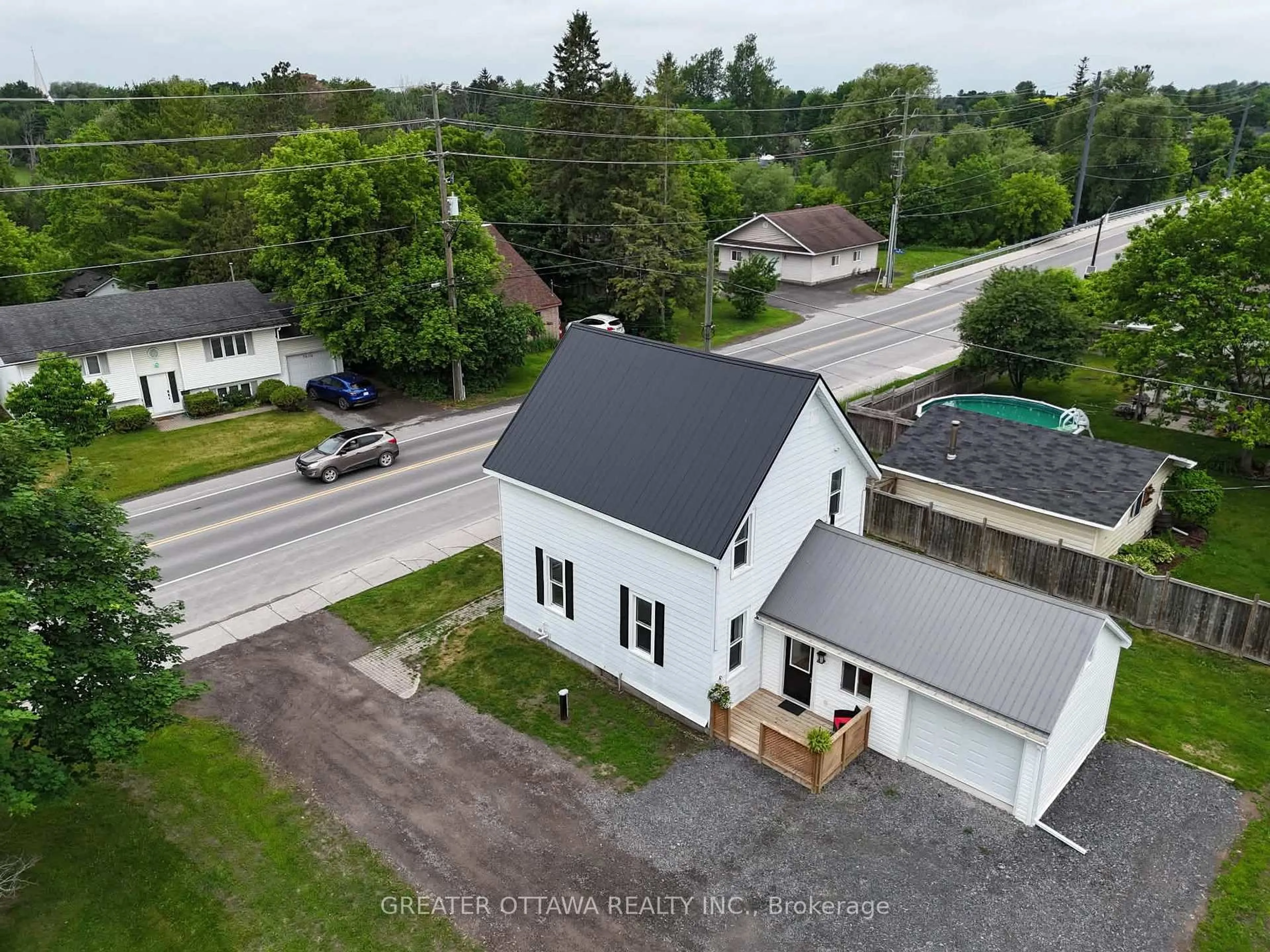 A pic from outside/outdoor area/front of a property/back of a property/a pic from drone, street for 3607 McBean St, Richmond Ontario K0A 2Z0