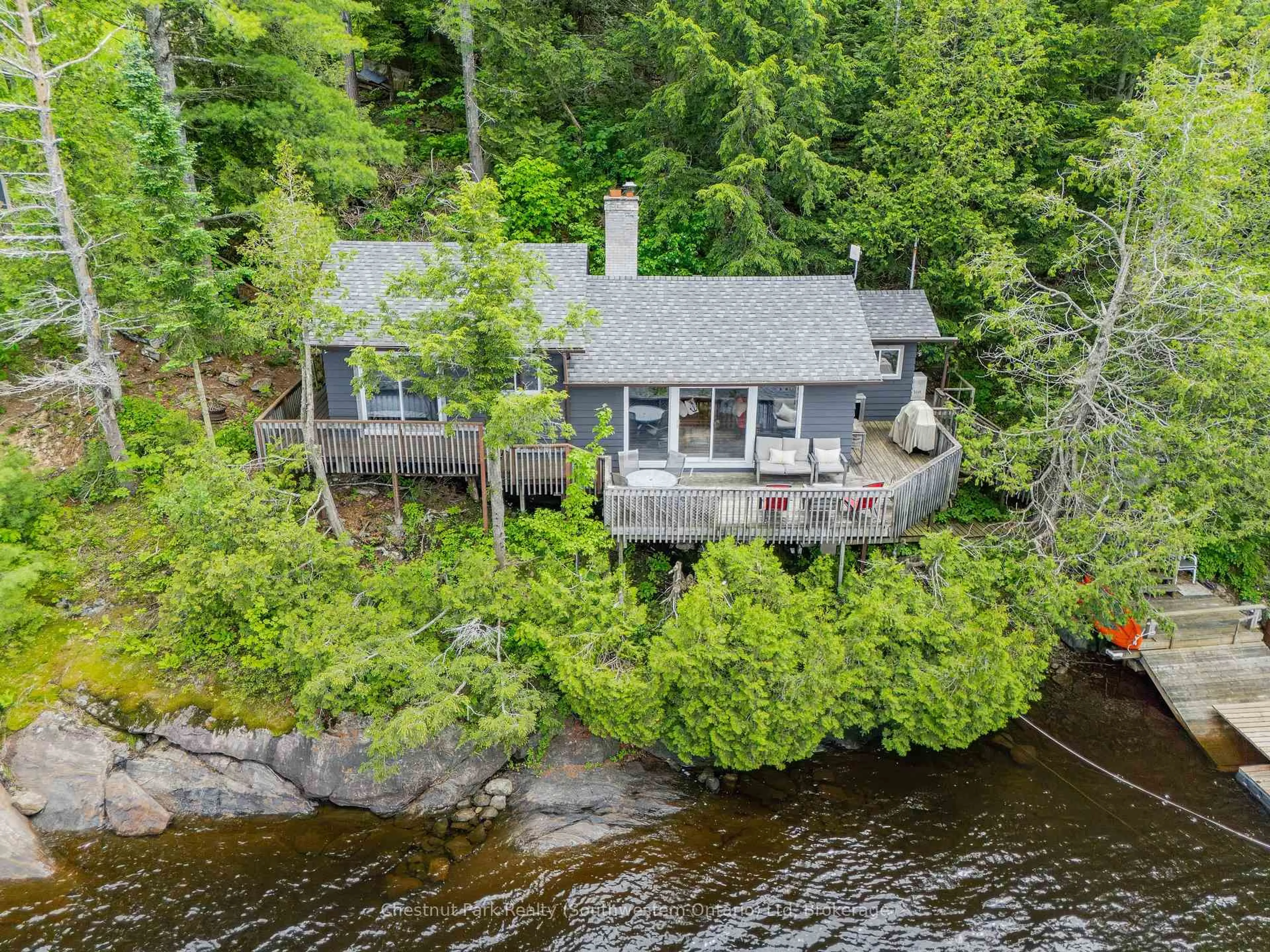 A pic from outside/outdoor area/front of a property/back of a property/a pic from drone, water/lake/river/ocean view for 3228 Twelve Mile Bay Rd, Georgian Bay Ontario P0C 1H0