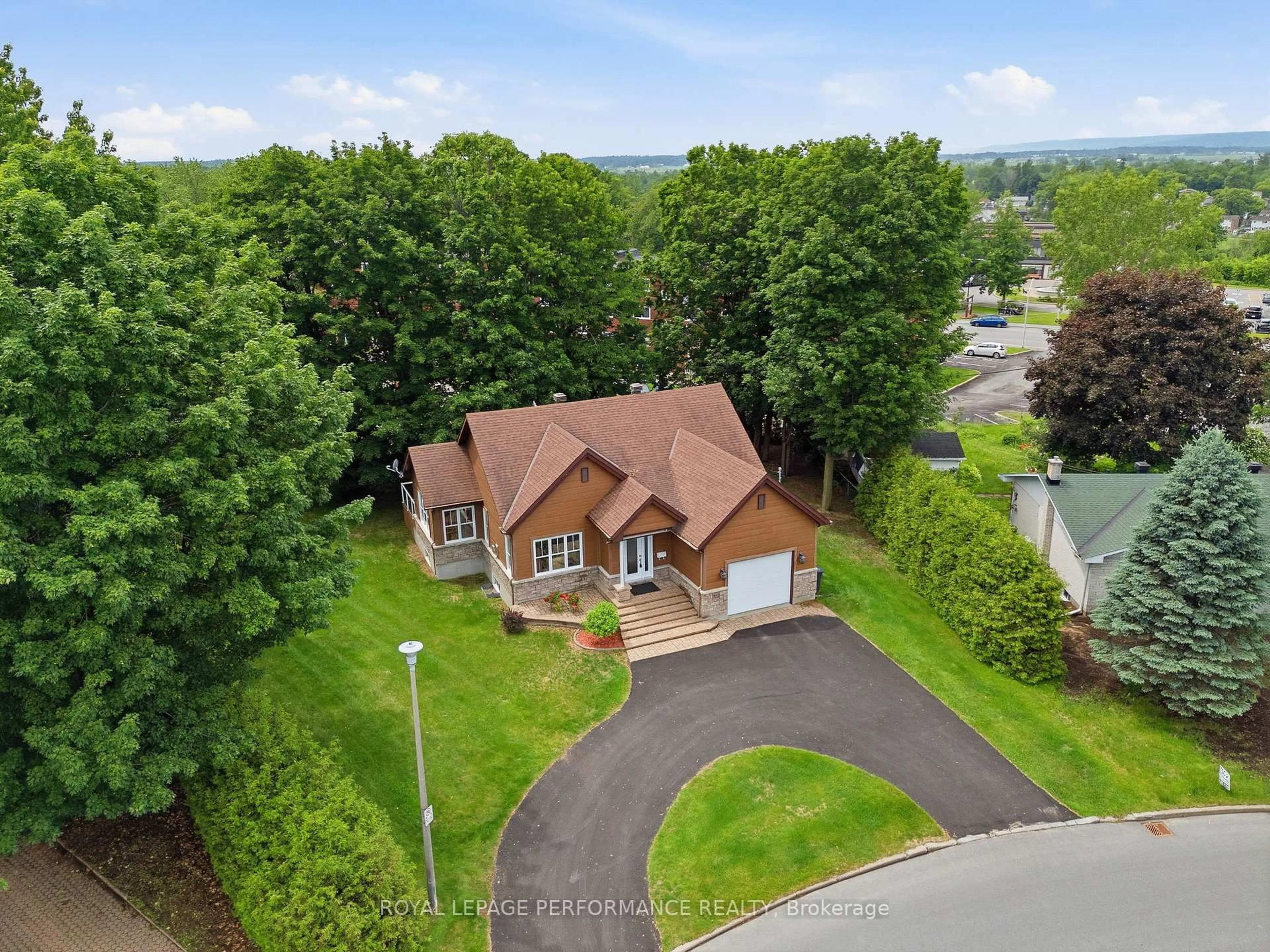 A pic from outside/outdoor area/front of a property/back of a property/a pic from drone, unknown for 992 Ghislain St, Hawkesbury Ontario K6A 3B2