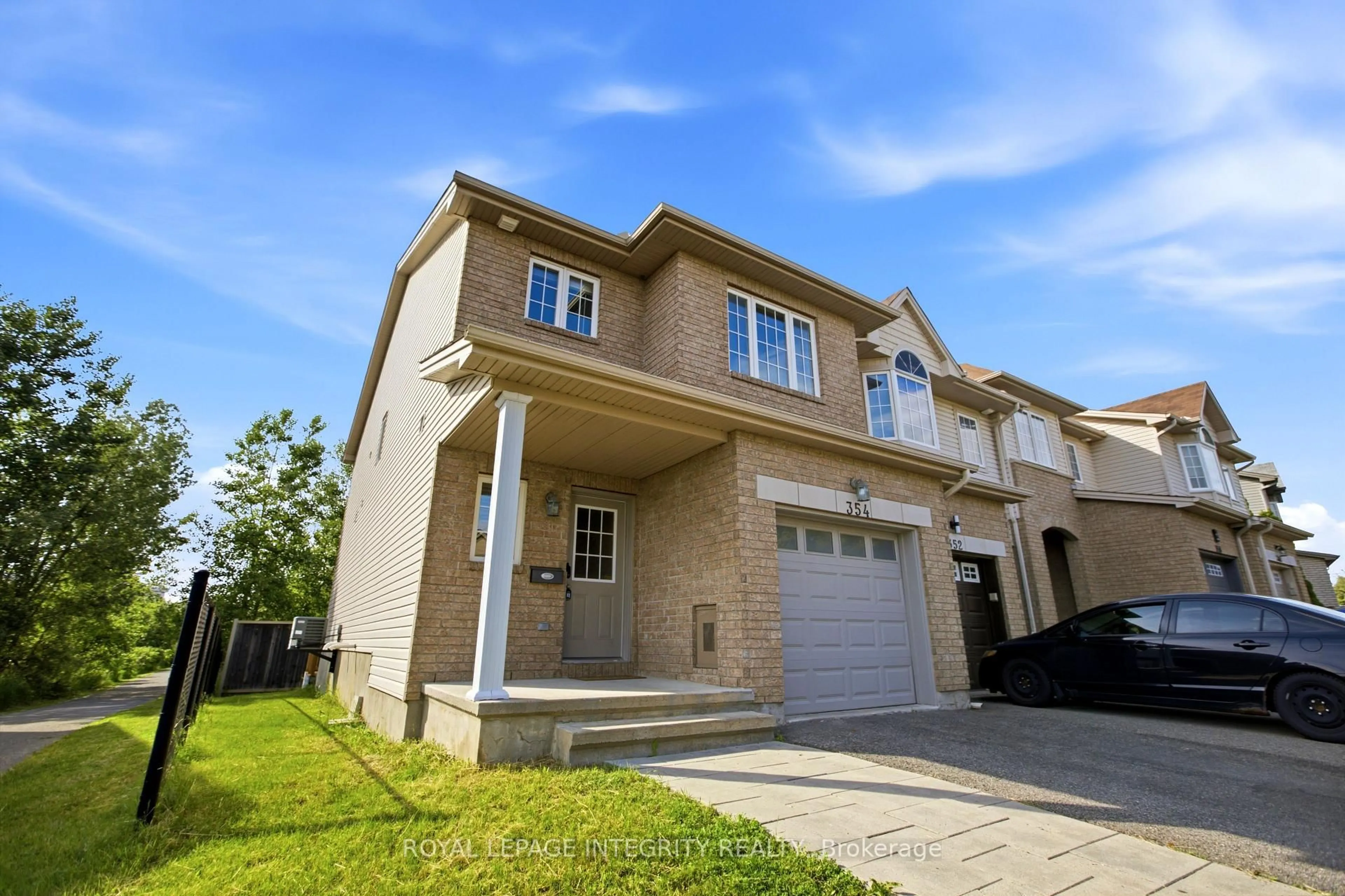 Home with brick exterior material, street for 354 Rolling Meadow Cres, Ottawa Ontario K1W 0A7