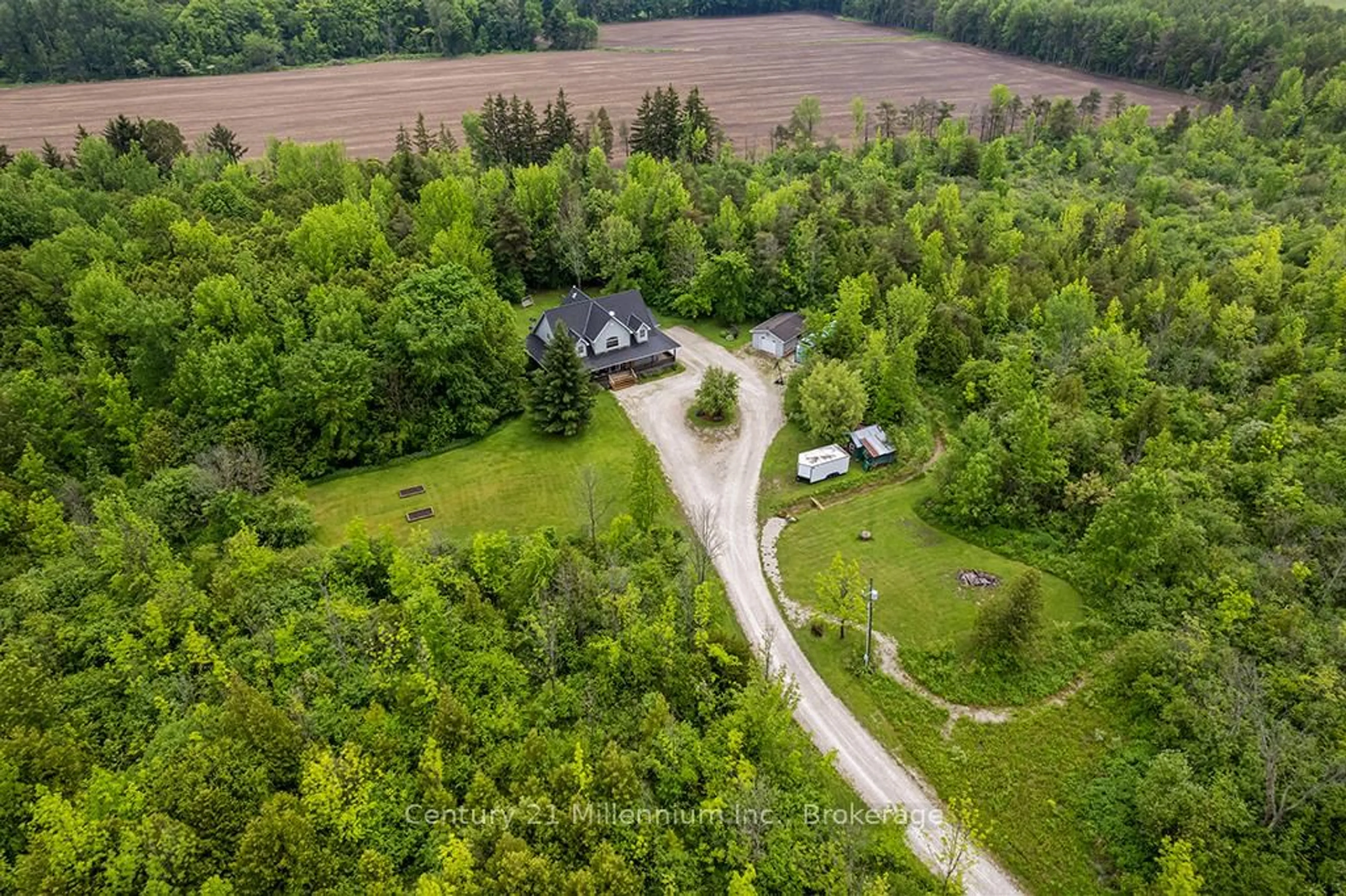 A pic from outside/outdoor area/front of a property/back of a property/a pic from drone, forest/trees view for 245650 22 Sdrd, Meaford Ontario N4L 0A7