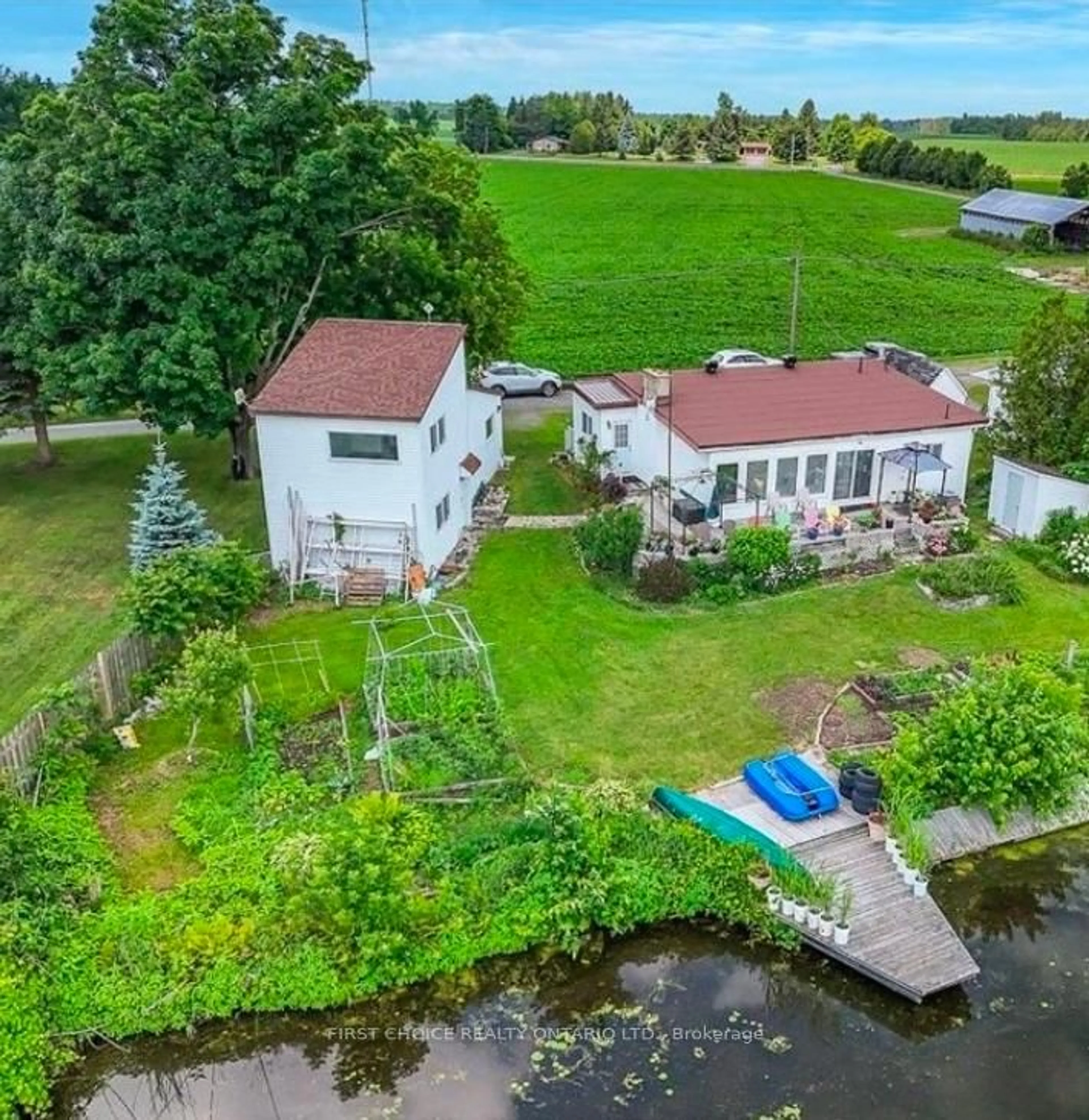 A pic from outside/outdoor area/front of a property/back of a property/a pic from drone, water/lake/river/ocean view for 2986 Beaman Lane, Kemptville Ontario K0G 1J0