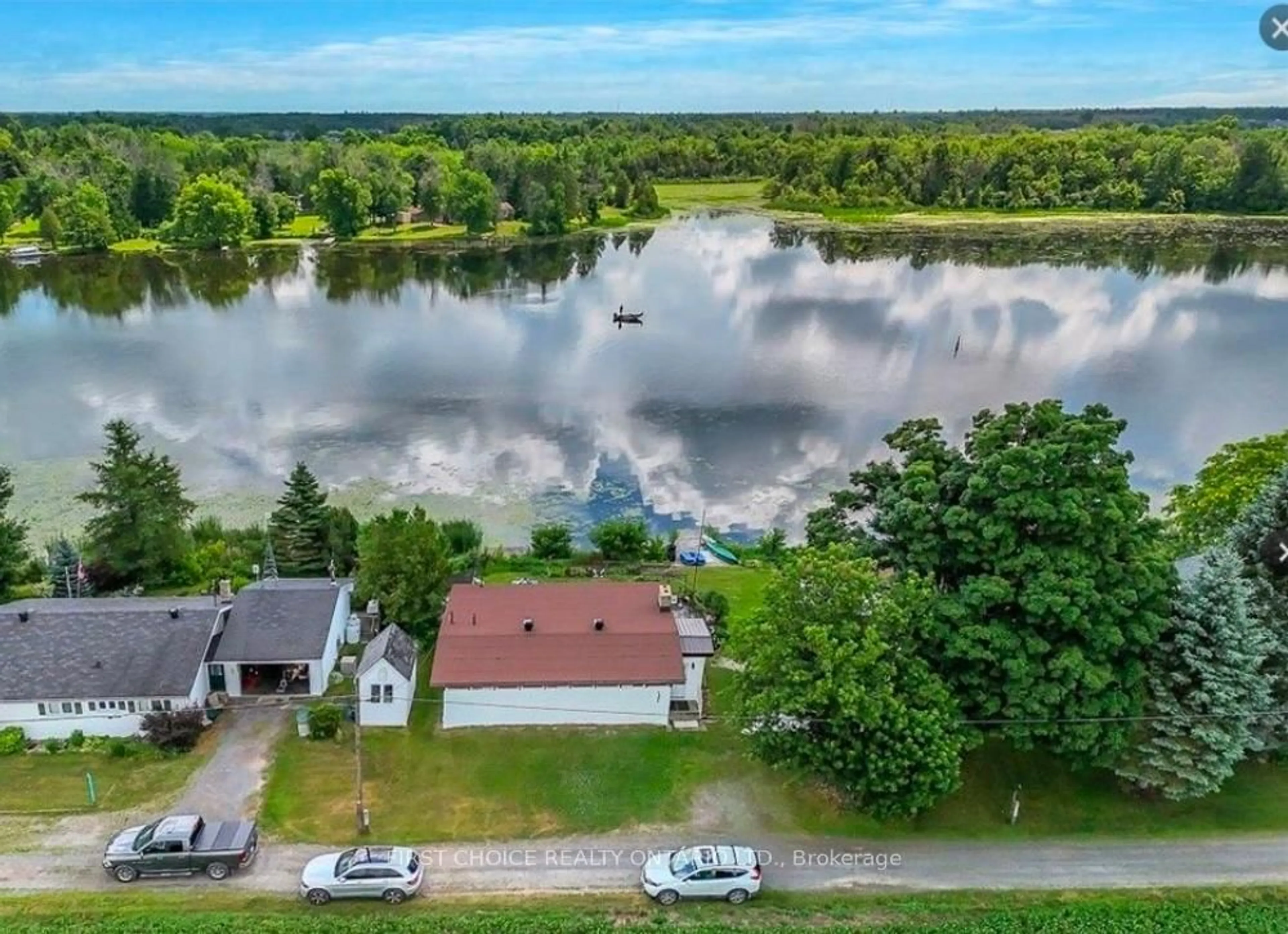 A pic from outside/outdoor area/front of a property/back of a property/a pic from drone, water/lake/river/ocean view for 2986 Beaman Lane, Kemptville Ontario K0G 1J0