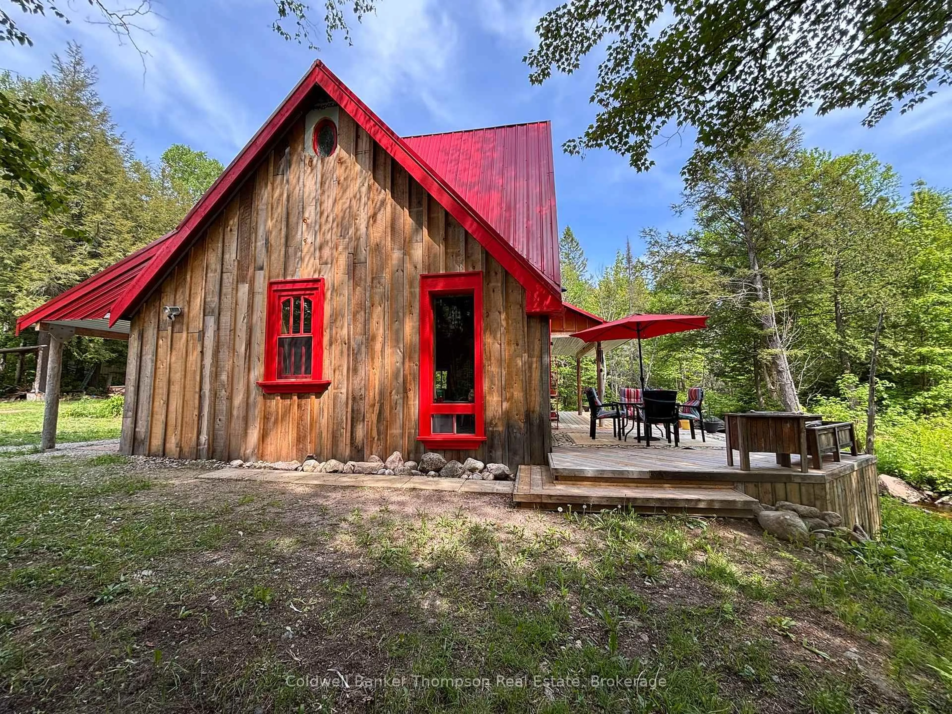 A pic from outside/outdoor area/front of a property/back of a property/a pic from drone, unknown for 63 Forestry Rd, Powassan Ontario P0H 2L0
