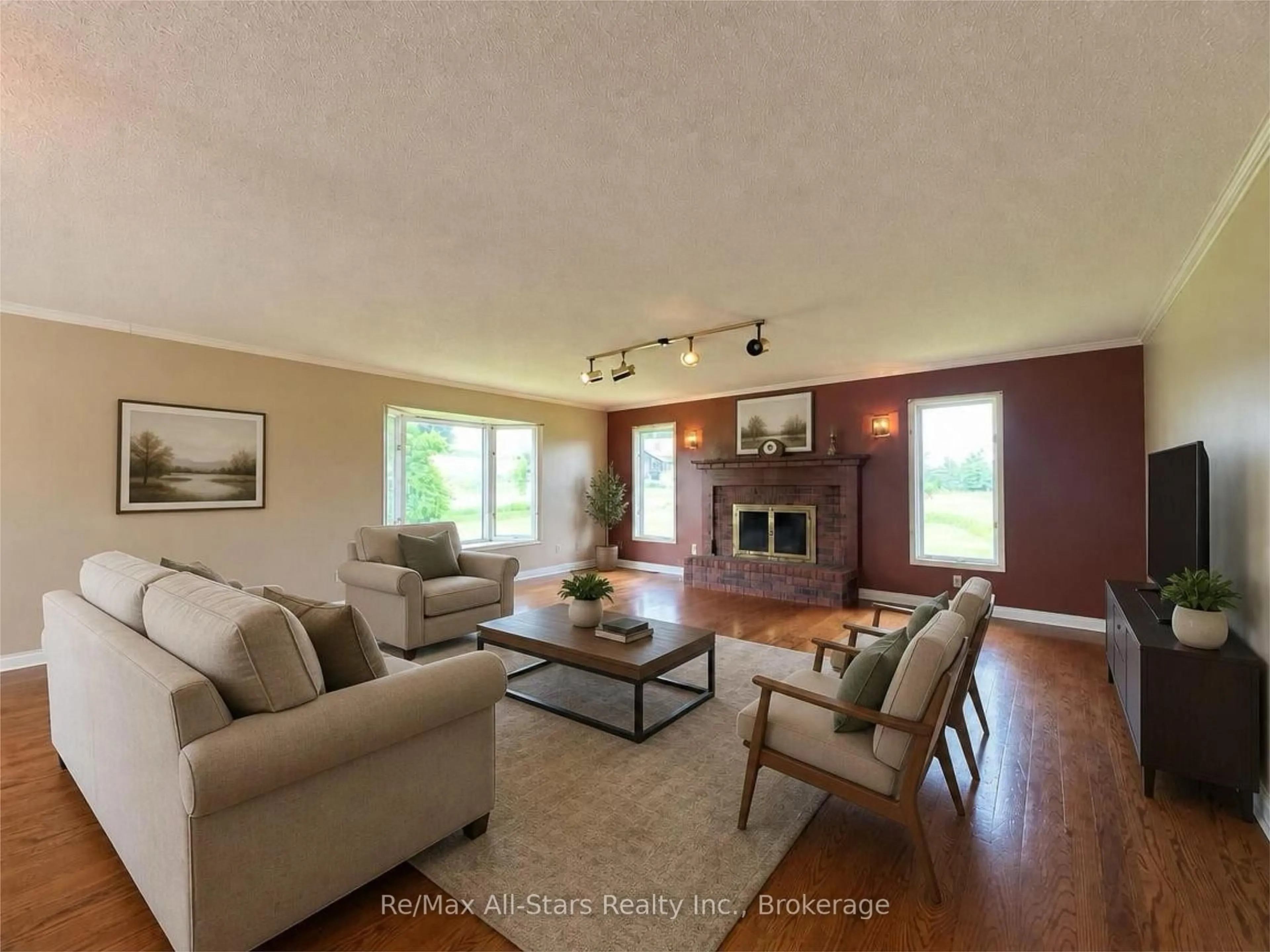 Living room with furniture, wood/laminate floor for 272 Providence Rd, Kawartha Lakes Ontario K0M 1N0