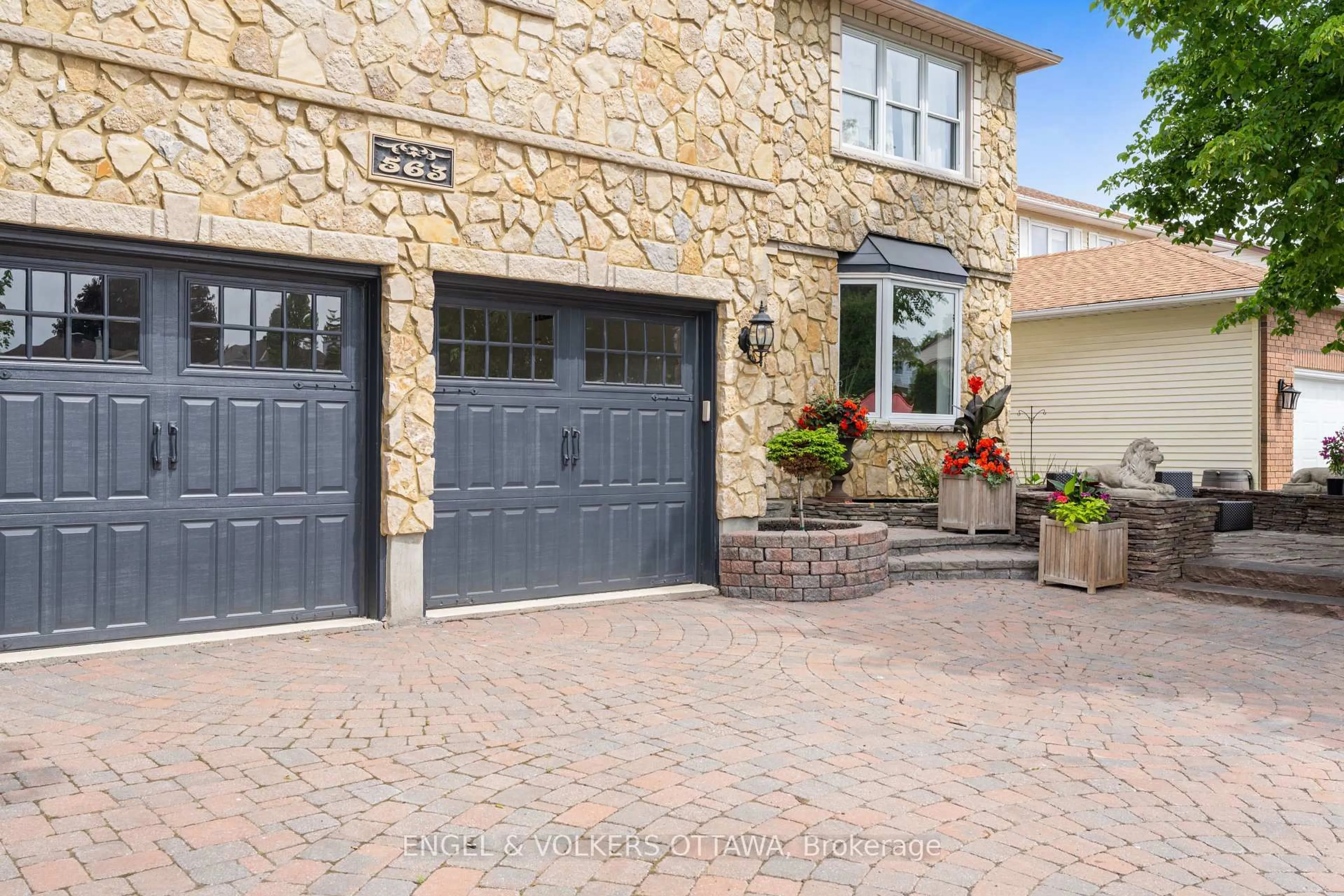 Home with brick exterior material, street for 563 Merkley Dr, Ottawa Ontario K4A 1V9