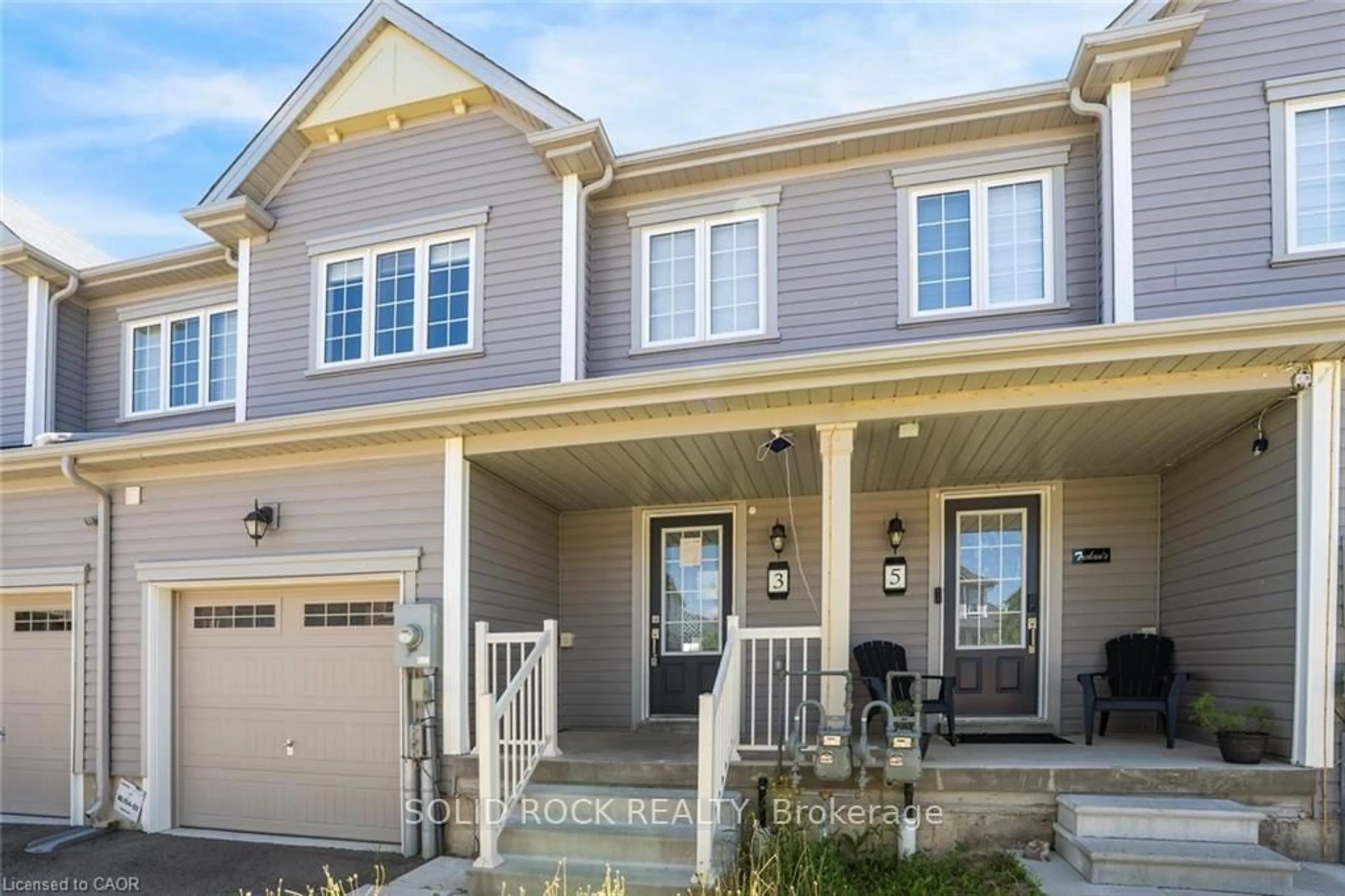 Home with vinyl exterior material, street for 3 Cooke Ave, Brantford Ontario N3T 0S2